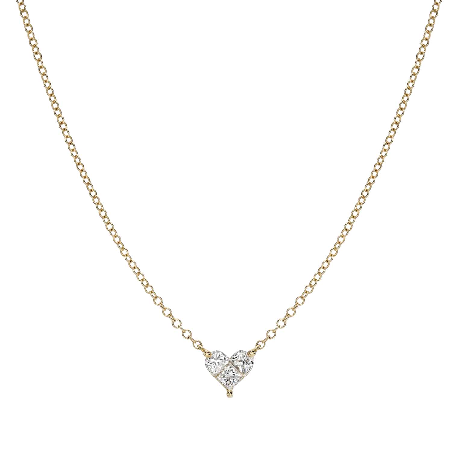 The Solitaire Heart Cut Diamond Necklace features a delicate gold chain with a small, heart-shaped diamond pendant. This exquisite piece can be customized to your style, ensuring the thin chain perfectly highlights the sparkling gem.