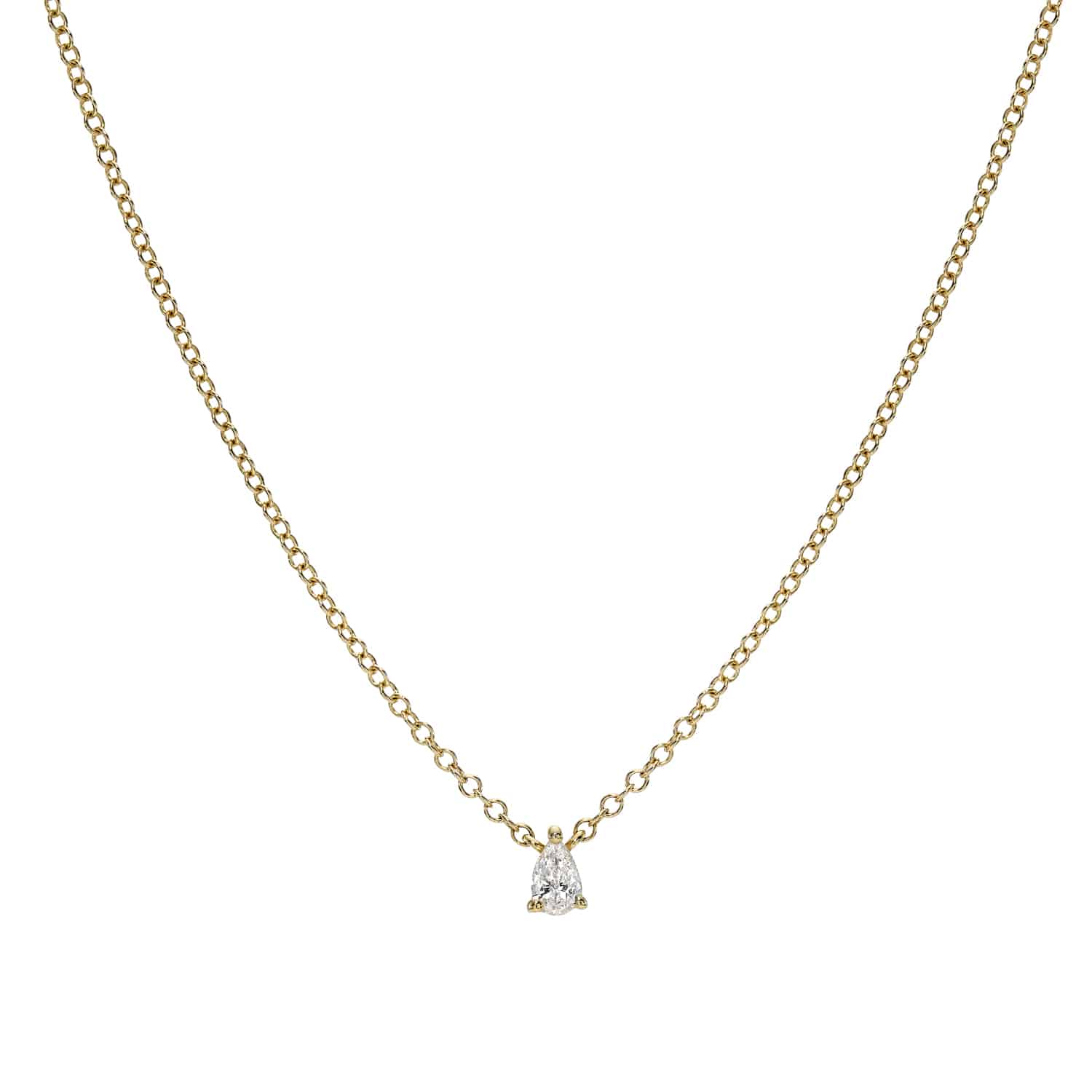 The Solitaire Pear Cut Diamond Necklace from Janet Heller Fine Jewelry is crafted in 14KT gold.  The necklace features a delicate chain with a pear-shaped diamond drop. The adjustable necklace can be worn on its own or layered.
