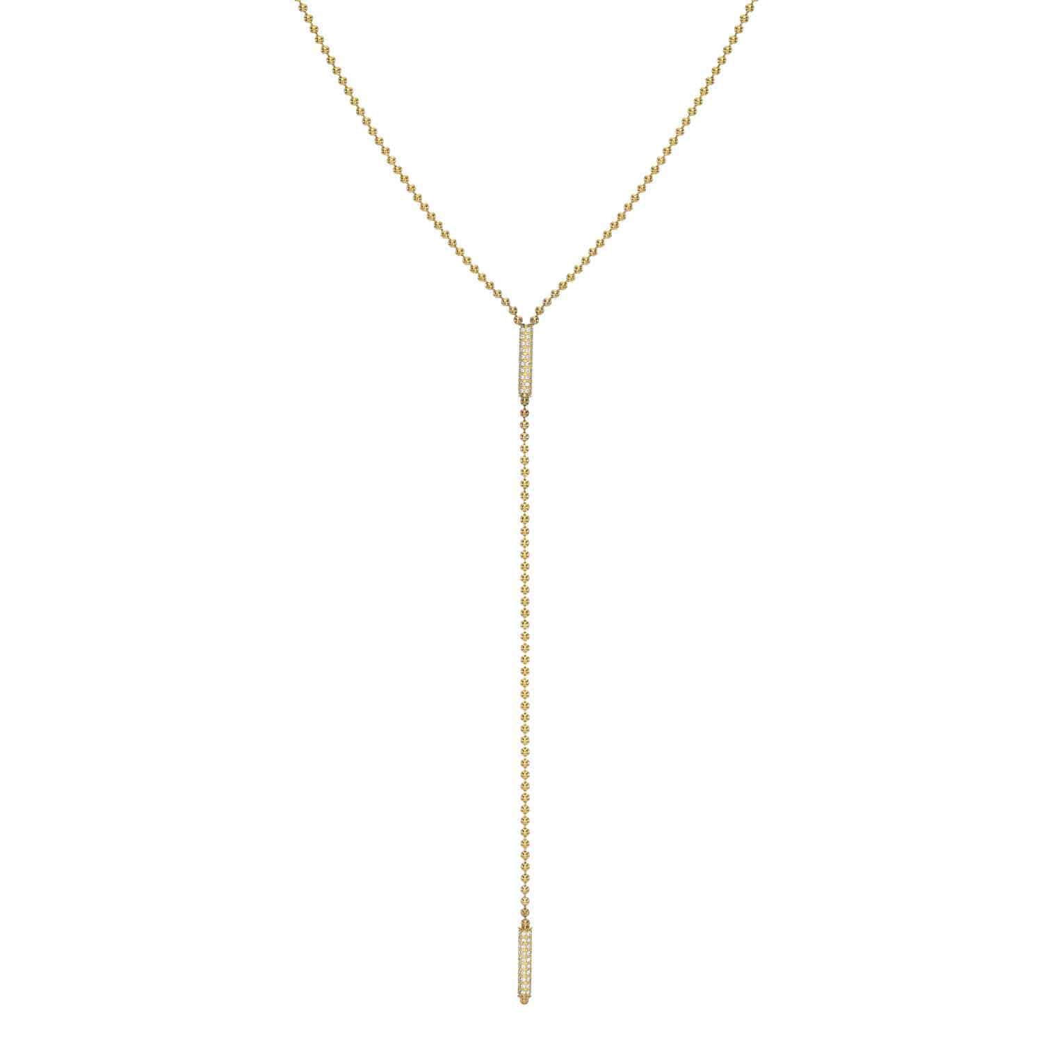 The Janet Heller Fine Jewelry collection presents the Toilet Chain Diamond Barrels Lariat, a stunning Y-shaped gold necklace. Its fine, delicate chain elegantly showcases two small vertical bars at the drop section ends.
