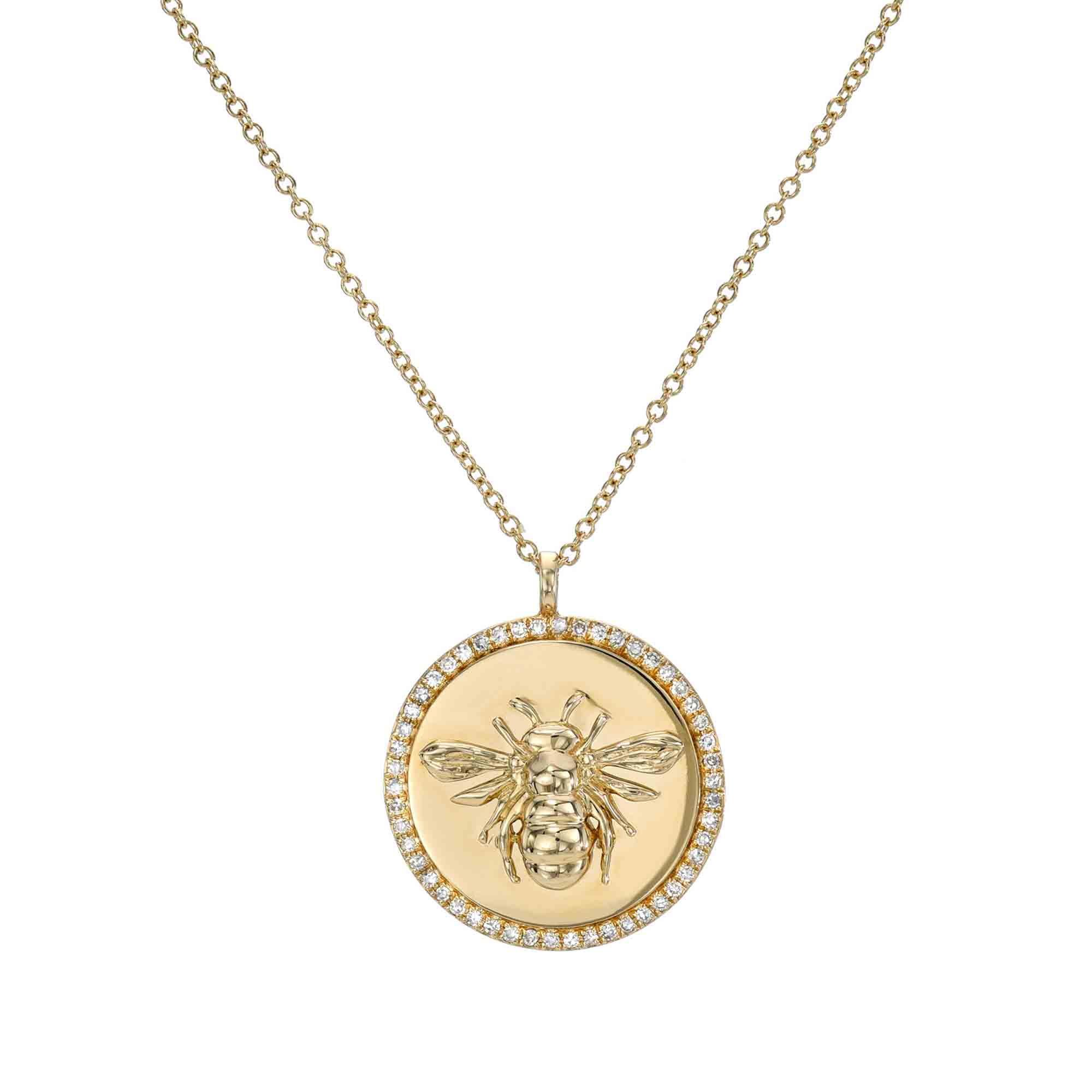 Experience the elegance of Janet Heller Fine Jewelry with the Diamond Bee Pendant Necklace, featuring a gold pendant with a raised bee design surrounded by small diamonds on a delicate chain.