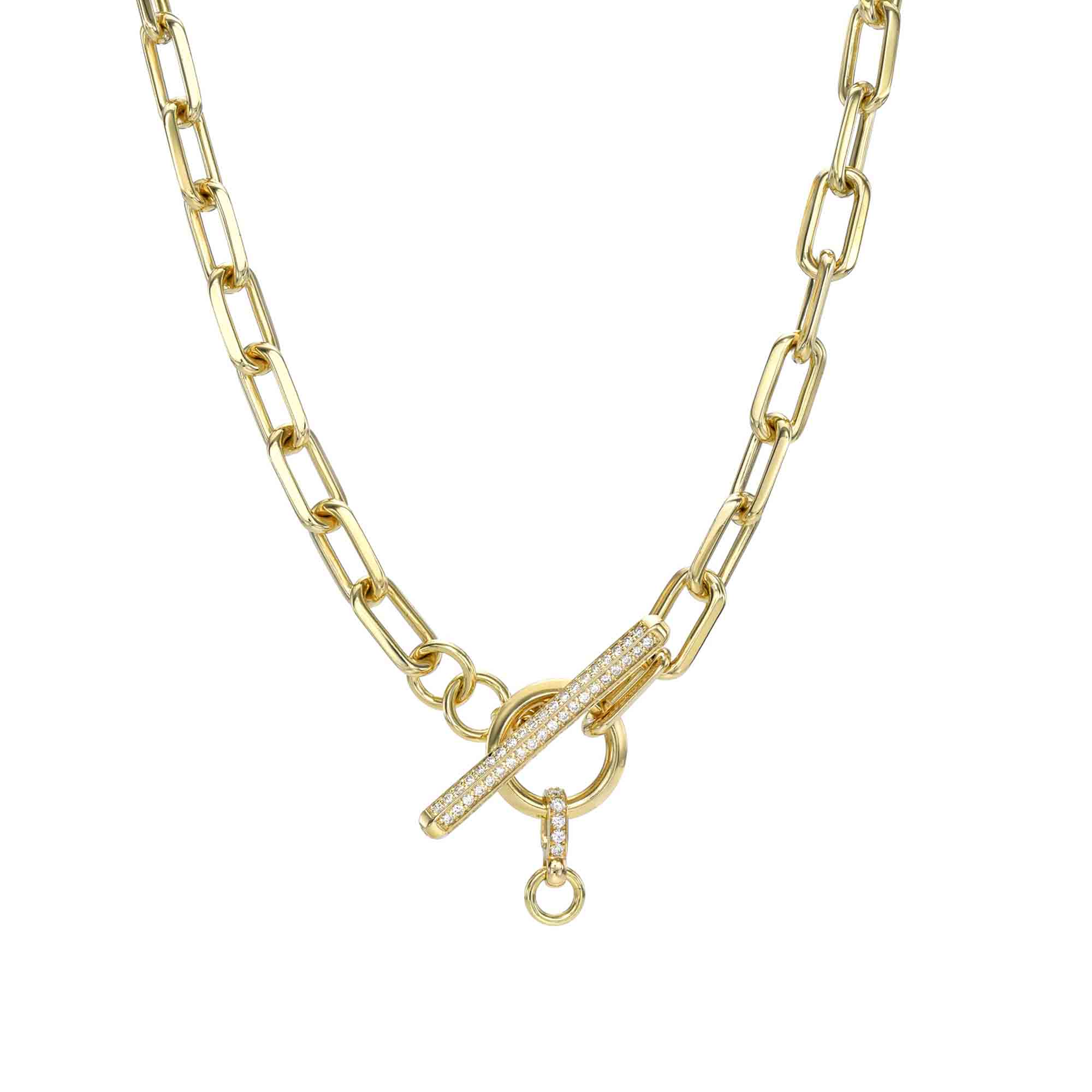 The Diamond Toggle Link Milan Chain from Janet Heller Fine Jewelry boasts large, elongated gold links and an exquisite decorative toggle clasp with embedded crystals, making it an elegant addition to any ensemble.