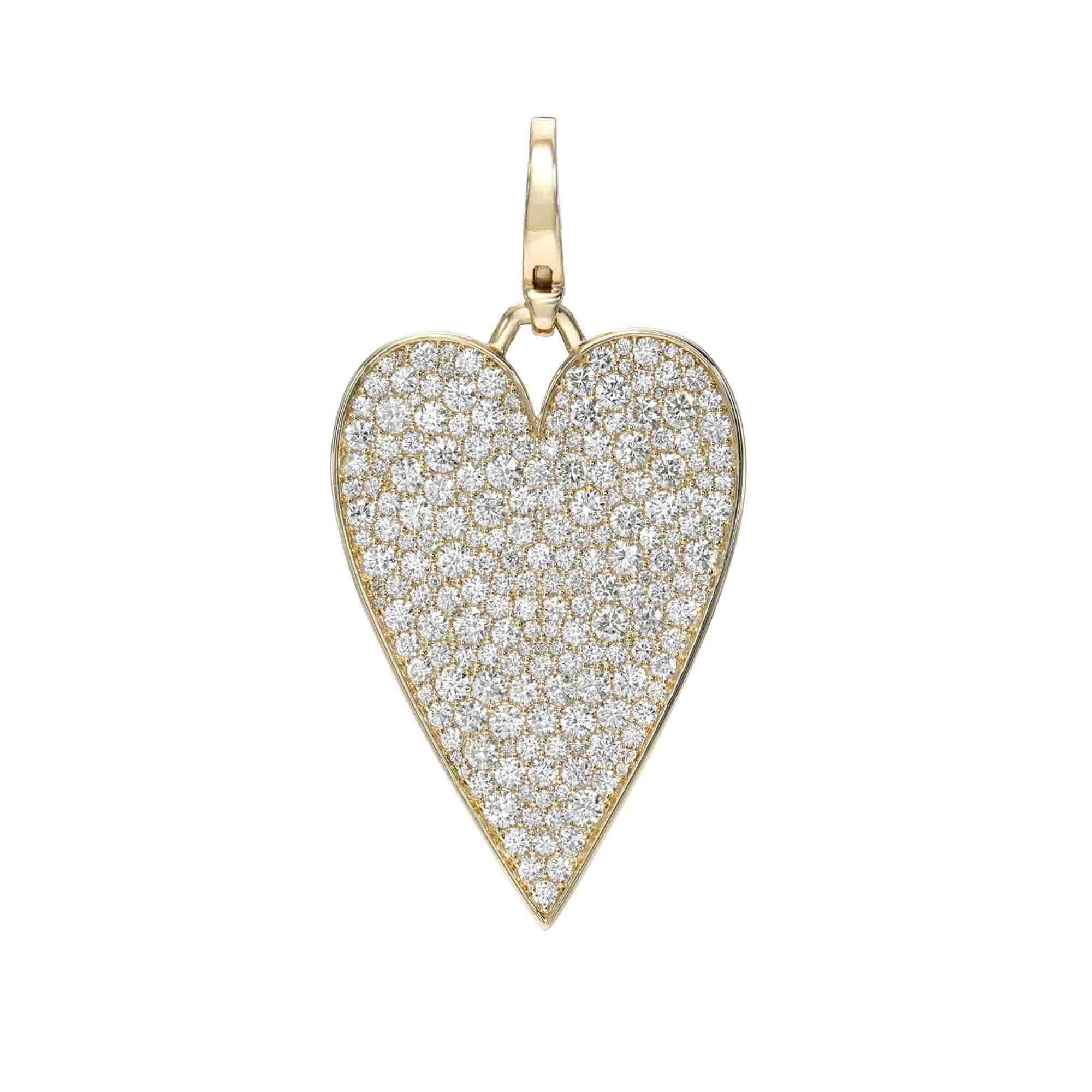 The Jumbo Flat Diamond Heart Charm features a heart-shaped pendant adorned with numerous small diamonds and a gold loop for attaching to a chain. Explore customizations at Janet Heller Fine Jewelry to add personalized charms for a unique touch.