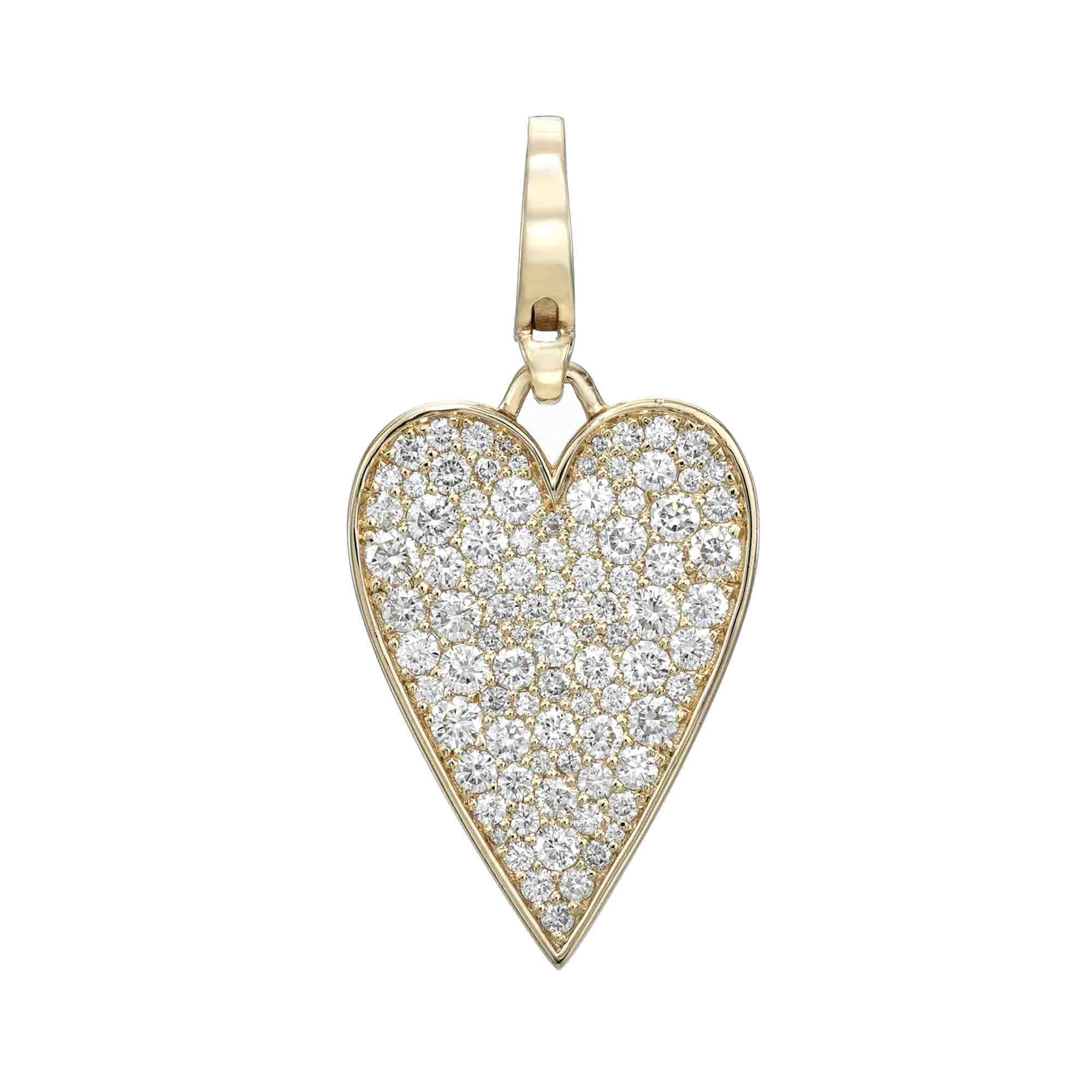 The Large Flat Diamond Heart Charm from Janet Heller Fine Jewelry is crafted in 14KT gold. The heart-shaped pendant is adorned with small white diamonds. The diamond clasp clips easily onto various Janet Heller Fine Jewelry chains and necklaces.
