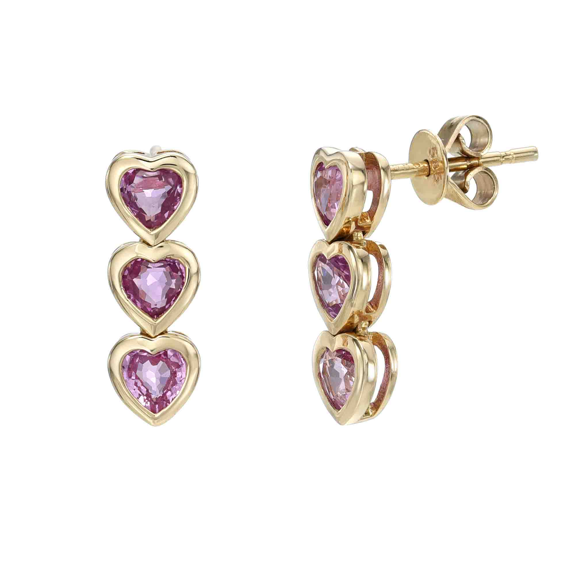 The Pink Sapphire Heart Drop Earrings from Janet Heller Fine Jewelry feature three stacked heart-shaped pink sapphires elegantly set in gold with a post and back design. For inquiries or customizations, please contact us.