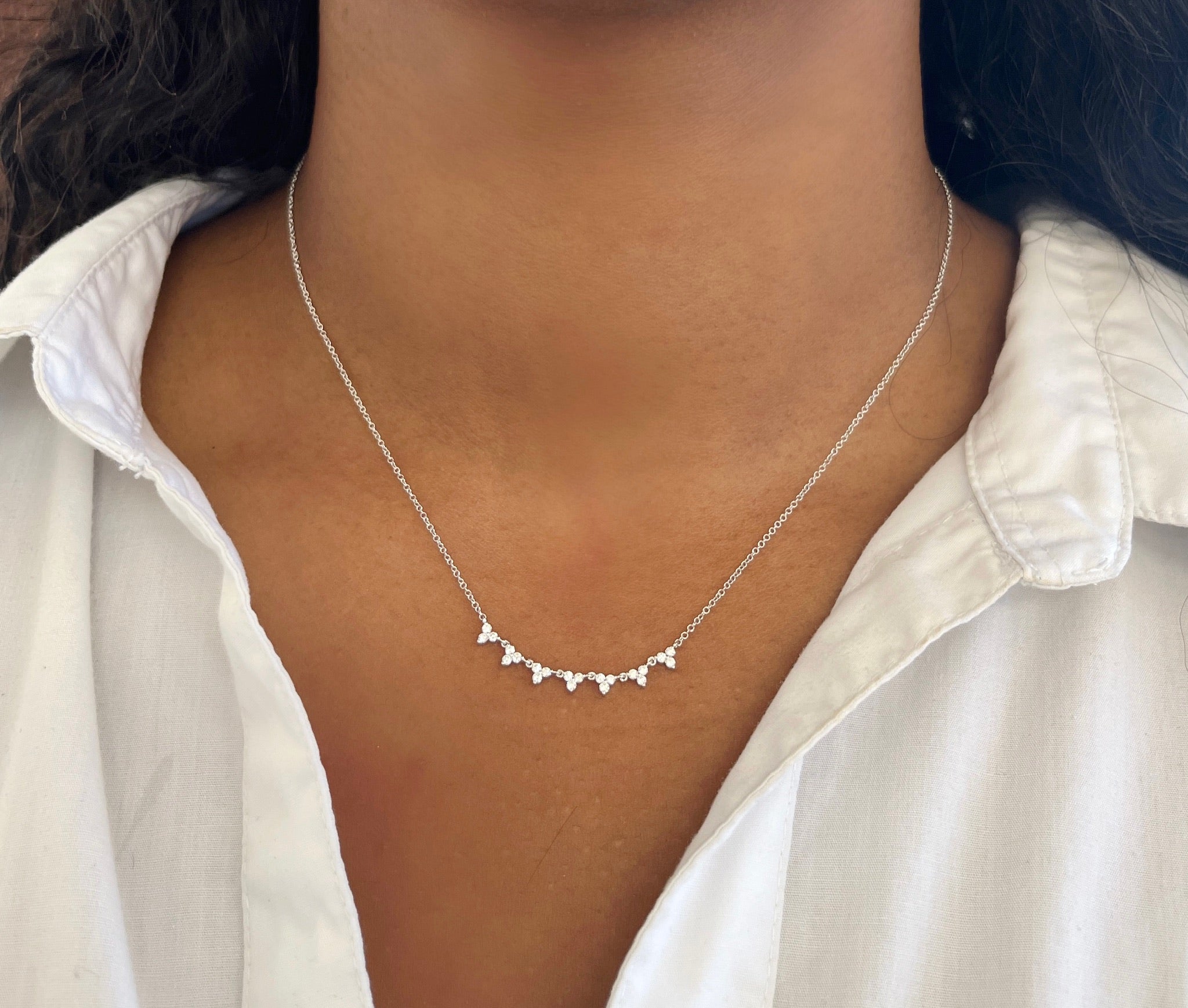 The Diamond Brea Necklace from Janet Heller Fine Jewelry is crafted in 14KT white gold. The delicate necklace features a row of sparkling diamonds. The necklace can be worn alone or layered with other chains.