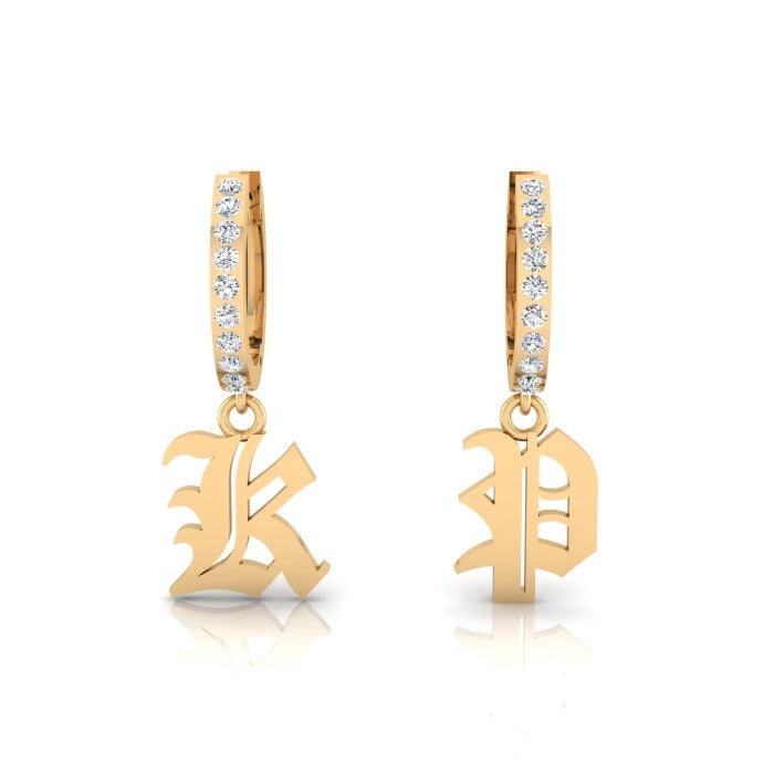 Explore the Small Old English Initial Huggies, featuring gold hoop earrings with dazzling stones and eye-catching initial pendants in an ornate font. This unique jewelry blends classic elegance with bold design, perfect for any occasion.