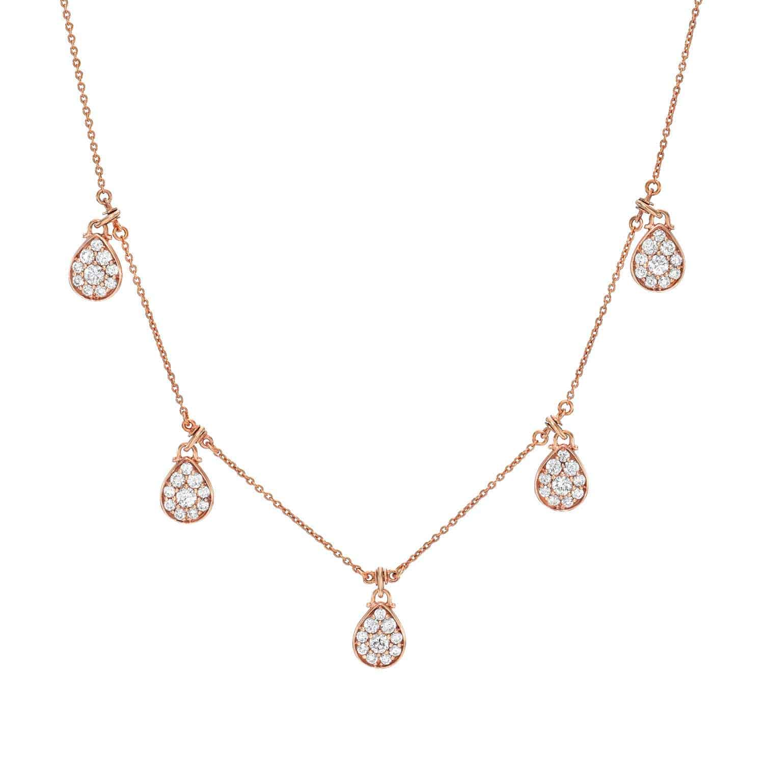 Pear Drop Diamond Necklace featuring five evenly spaced teardrop-shaped pendants, each set with sparkling white diamonds, elegantly suspended from a delicate rose gold chain.