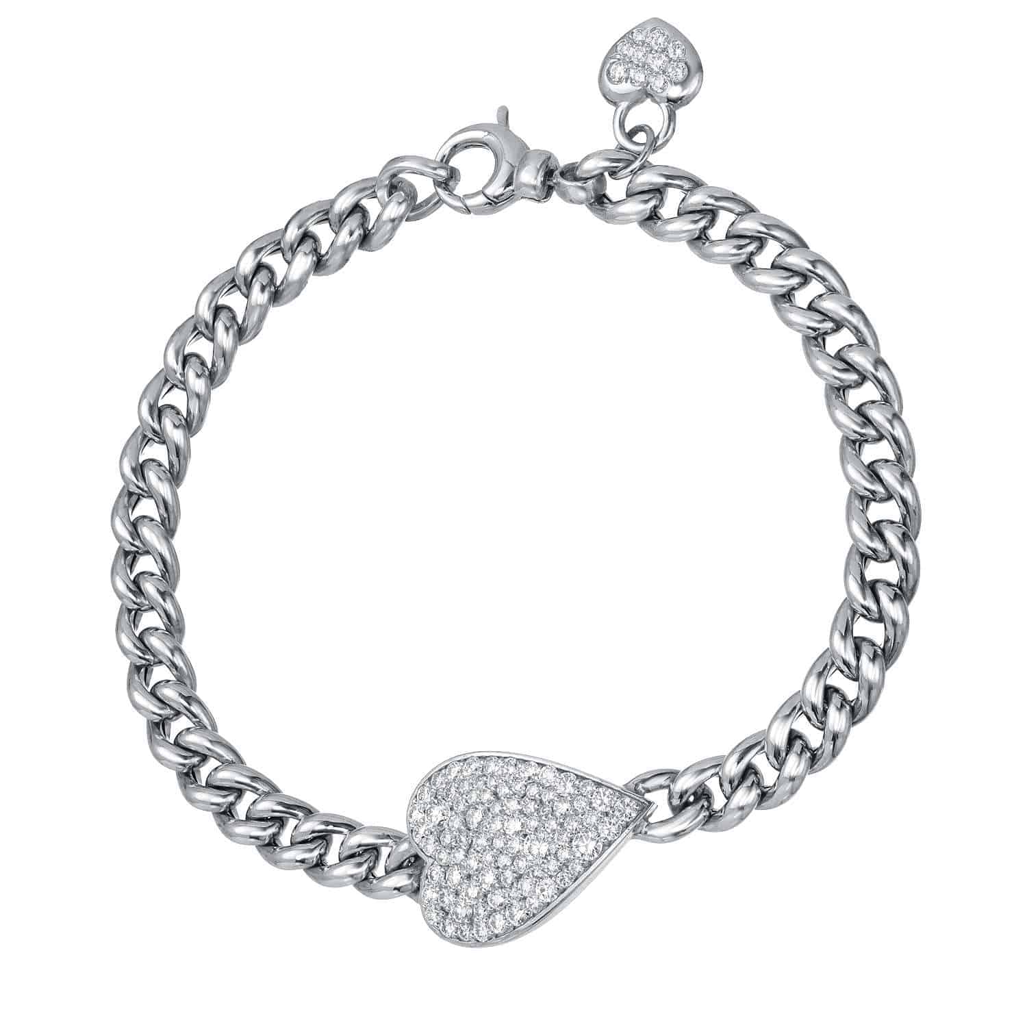 Introducing the Cuban Link Diamond Heart Bracelet: a silver chain bracelet adorned with a heart-shaped charm encrusted with sparkling stones. A smaller, stone-encrusted heart charm also dangles near the lobster claw clasp. Crafted as fine jewelry, this elegant piece embodies the timeless sophistication of Janet Heller Fine Jewelry.