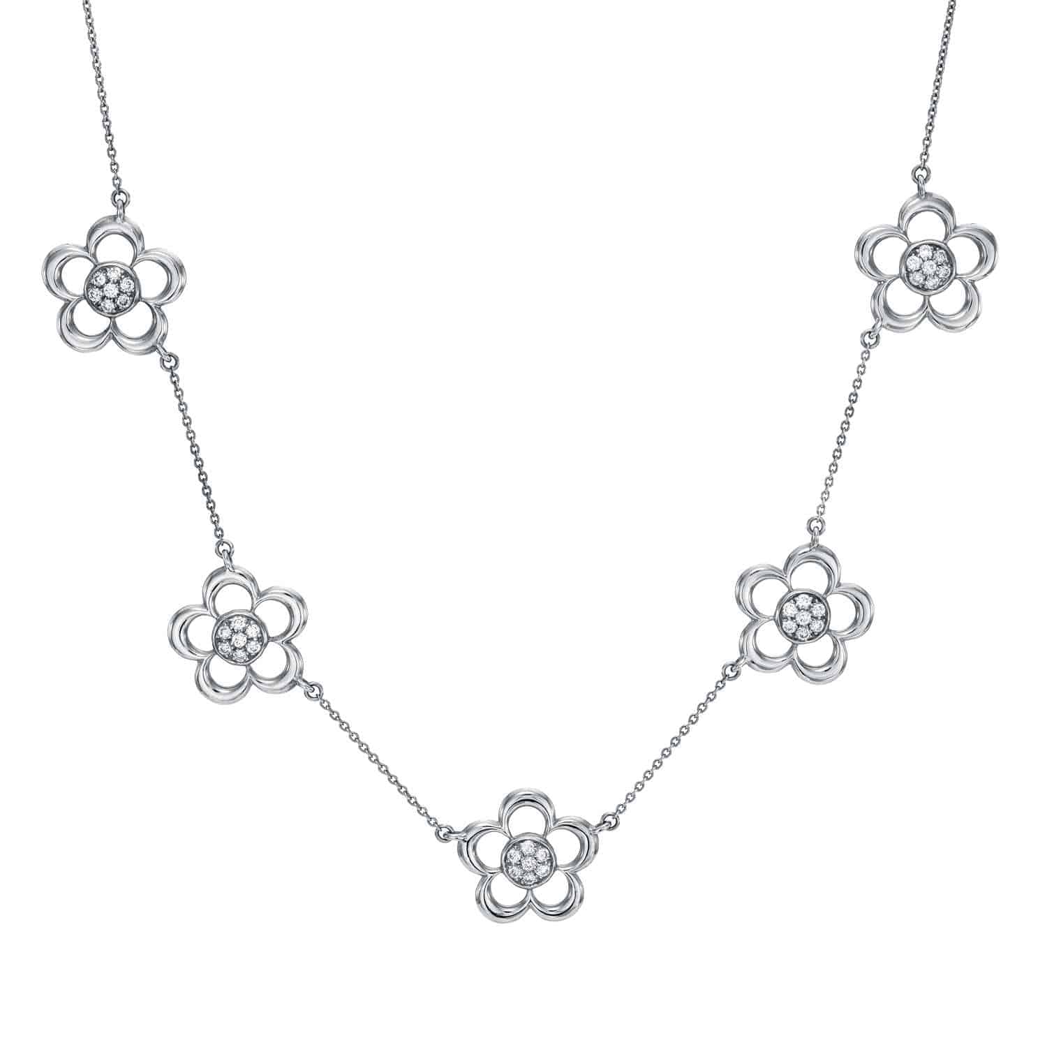 The Jumbo Diamond Flower Necklace is a silver necklace featuring five flower-shaped pendants, each adorned with a cluster of small round crystals at the center and evenly spaced along a delicate chain.