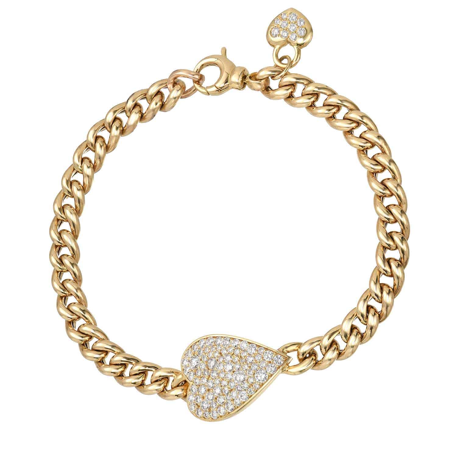 The Cuban Link Diamond Heart Bracelet from Janet Heller Fine Jewelry is crafted in 14KT gold.  The chain features a diamond-encrusted heart-shaped pendant and a smaller diamond heart dangles near the clasp. The diamonds are G-H in color and the clarity is VS.