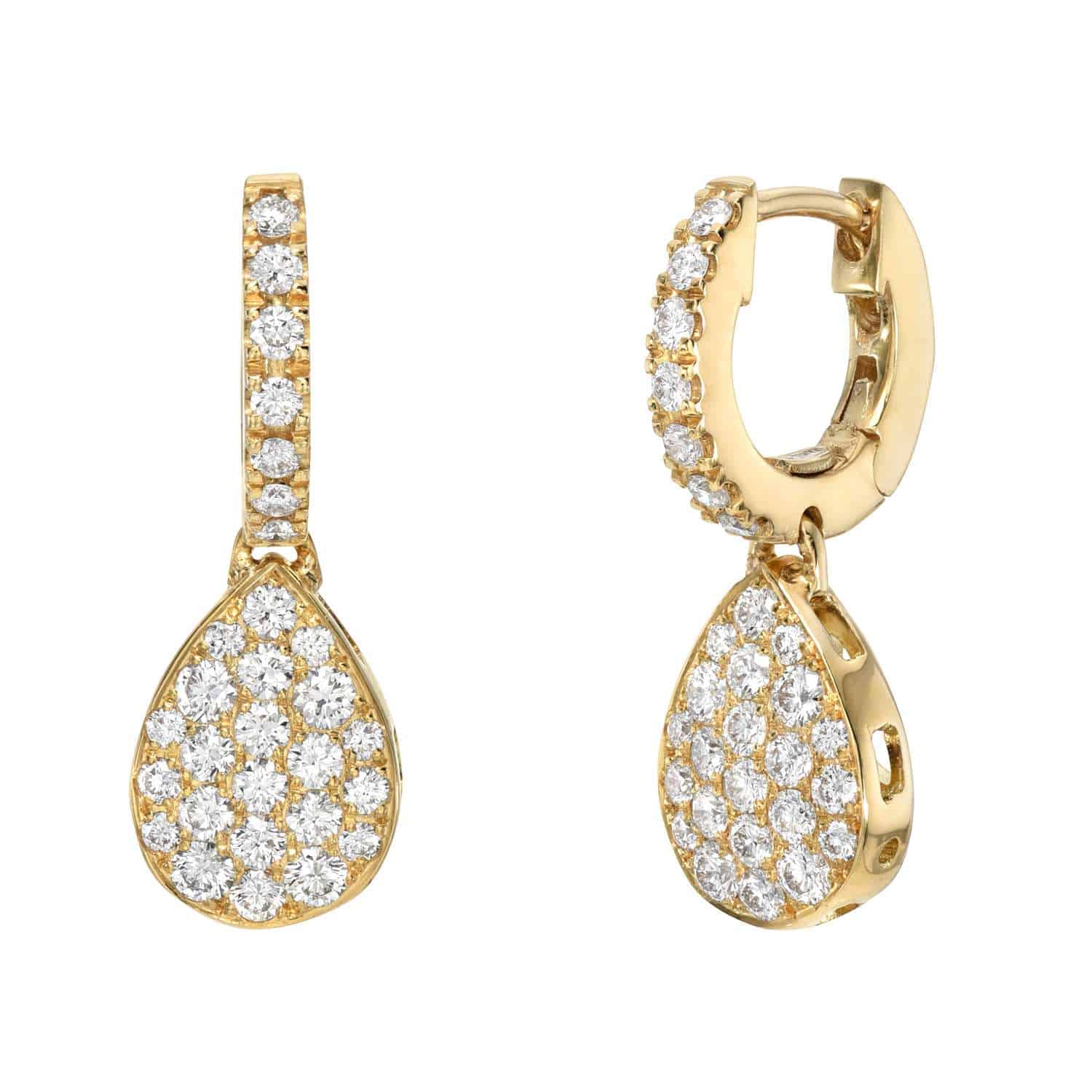 Explore the exquisite craftsmanship of Janet Heller Fine Jewelrys Pear Shaped Diamond Earrings, featuring teardrop-shaped pendants encrusted with sparkling diamonds. The design elegantly combines hoop and dangle elements, showcasing a mix of textures and shimmering stones.