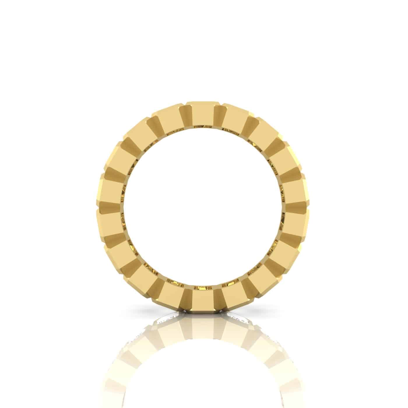 A Bezel Set Emerald Cut Eternity Ring in 18KT gold, featuring a unique segmented design and displayed upright on a white background. The surface reflects light, creating a mirror-like effect below.