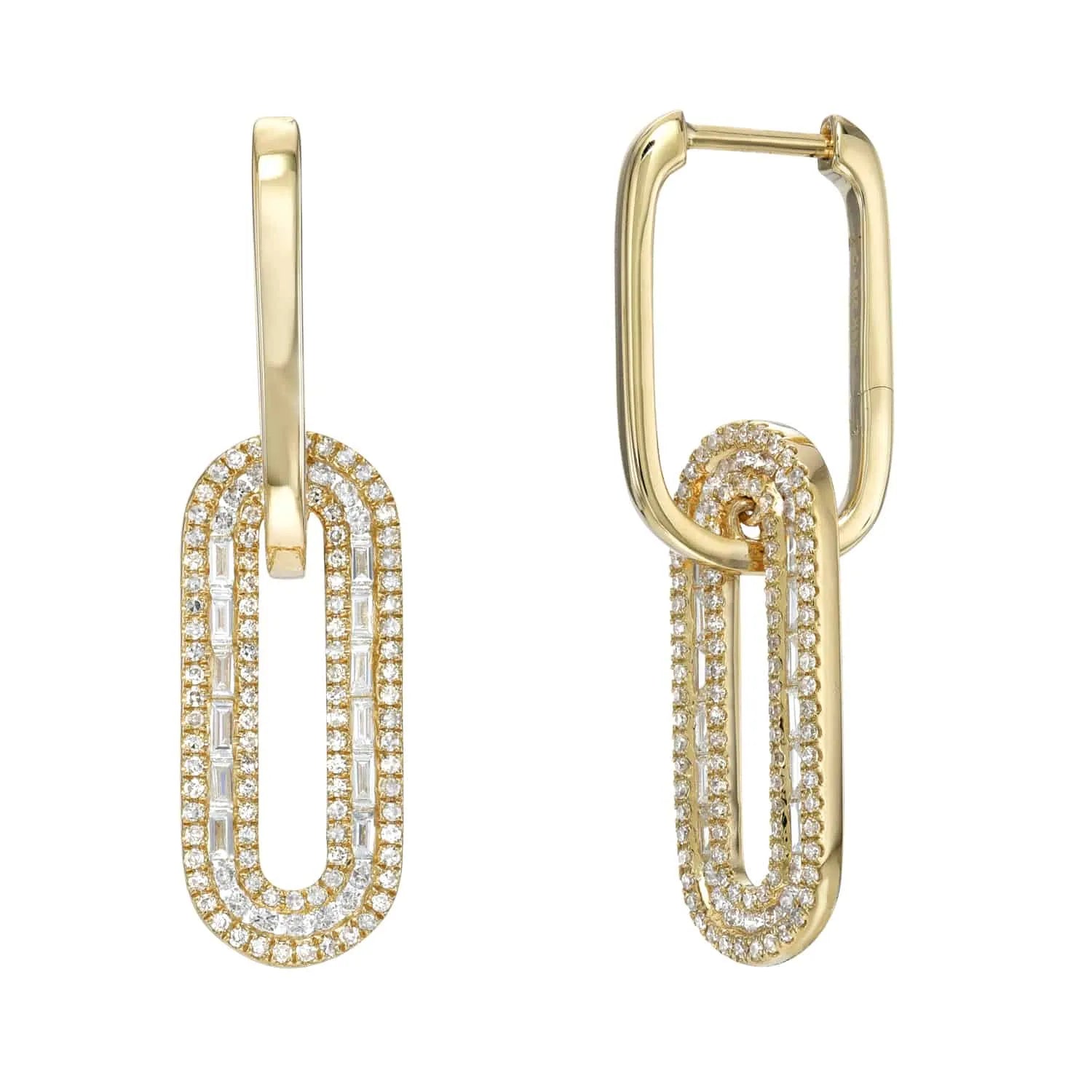 The Baguette Diamond Oval Link Earrings from Janet Heller Fine Jewelry feature gold dangle earrings with interlocking oval-shaped links, each adorned with sparkling diamonds. The paperclip-inspired design combines elegance with modern flair and offers personalization options.