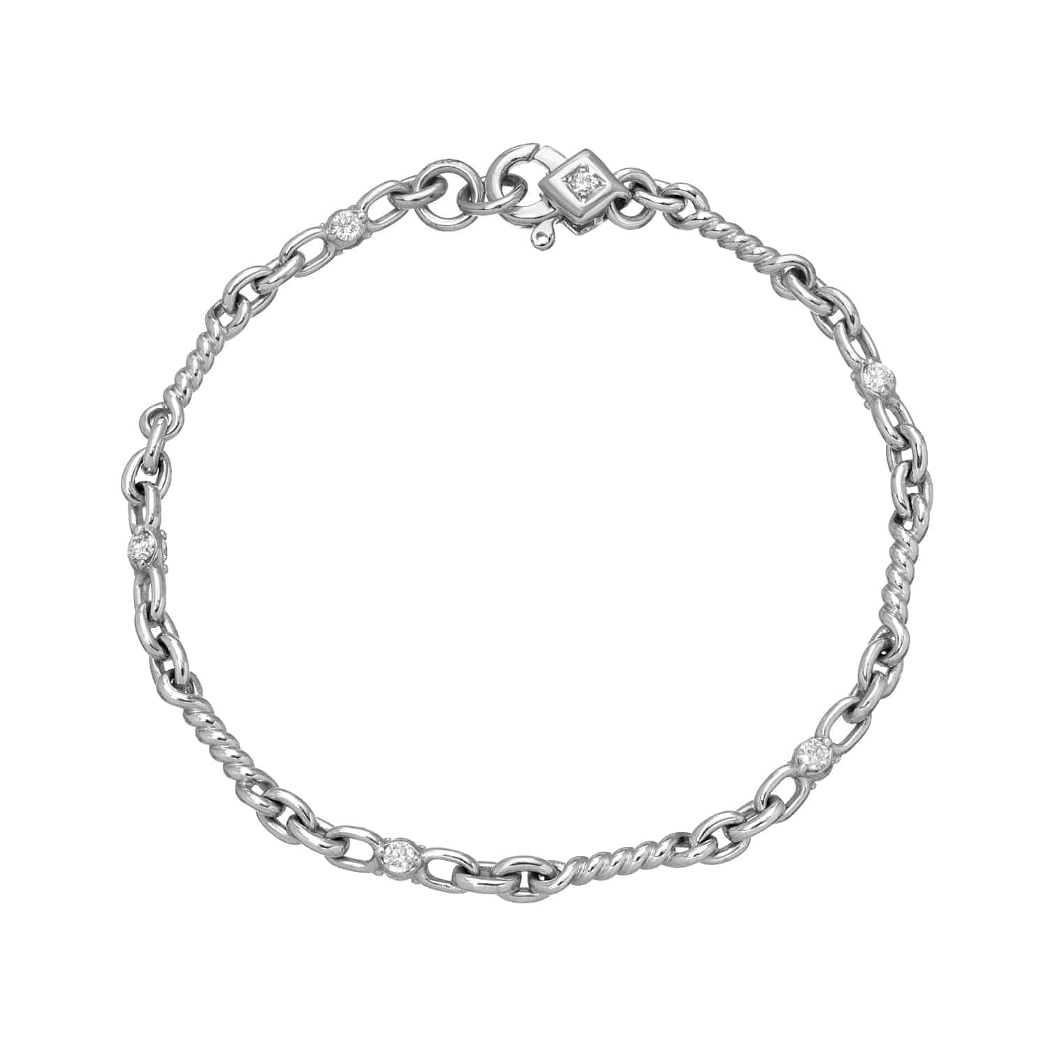 The Diamond Belle Bracelet from the Janet Heller Fine Jewelry collection features a 14KT gold chain with links and round diamond embellishments, complete with a square diamond clasp. The bracelet can be worn on its own or stacked with other bracelets.