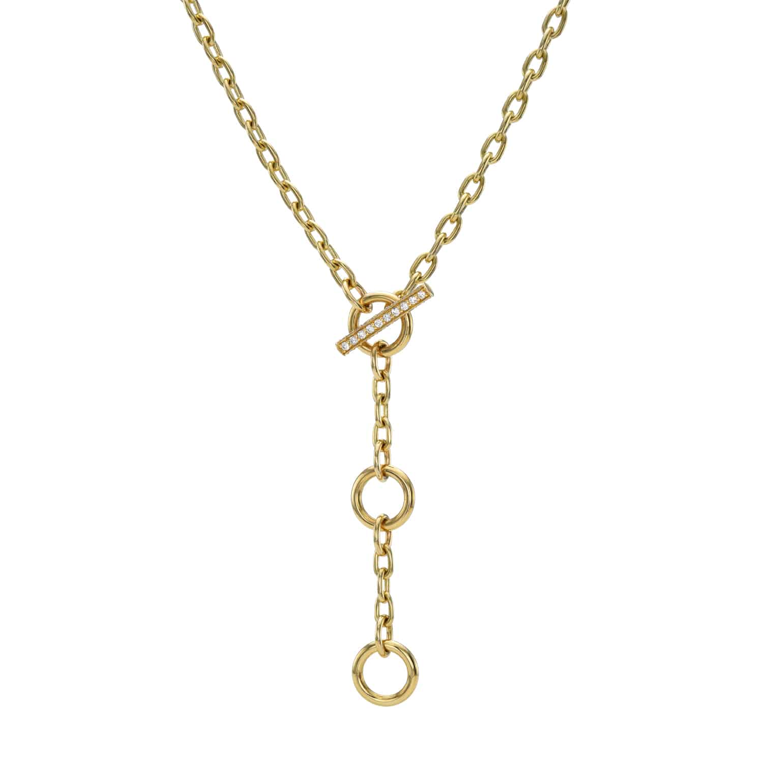 Experience the elegance of Janet Heller Fine Jewelry with the London Chain necklace. It features a gold chain with a vertical drop, three circular links, and is secured by a stylish bar-and-ring toggle clasp. This modern yet timeless design is perfect for showcasing your style.
