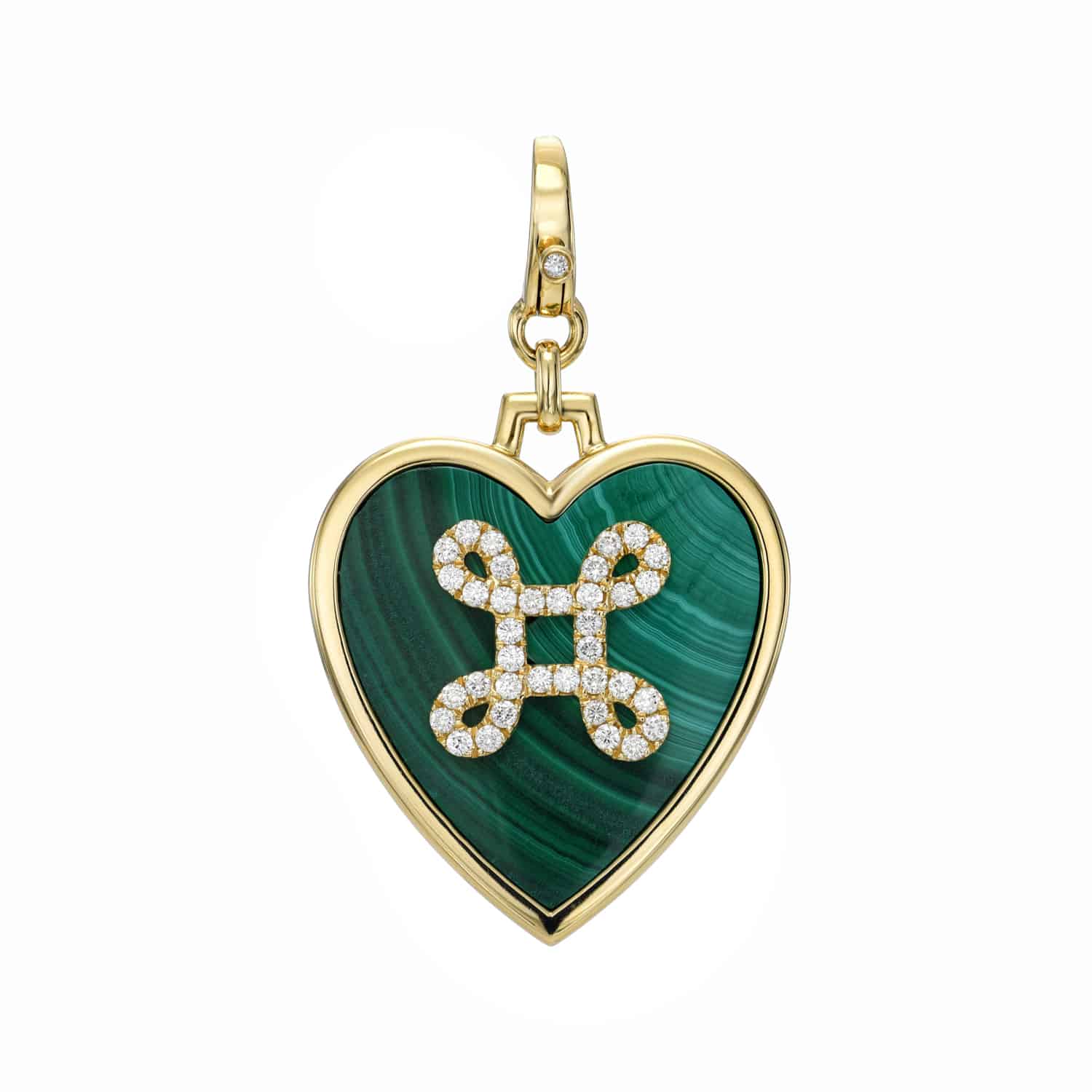 Experience the elegance of the Malachite Heart Love Knot Charm from Janet Heller Fine Jewelry. Featuring a gold frame, green malachite inlay, and an abstract diamond-studded pattern, its finished with a golden bail and single diamond—perfect for customizable jewelry lovers.