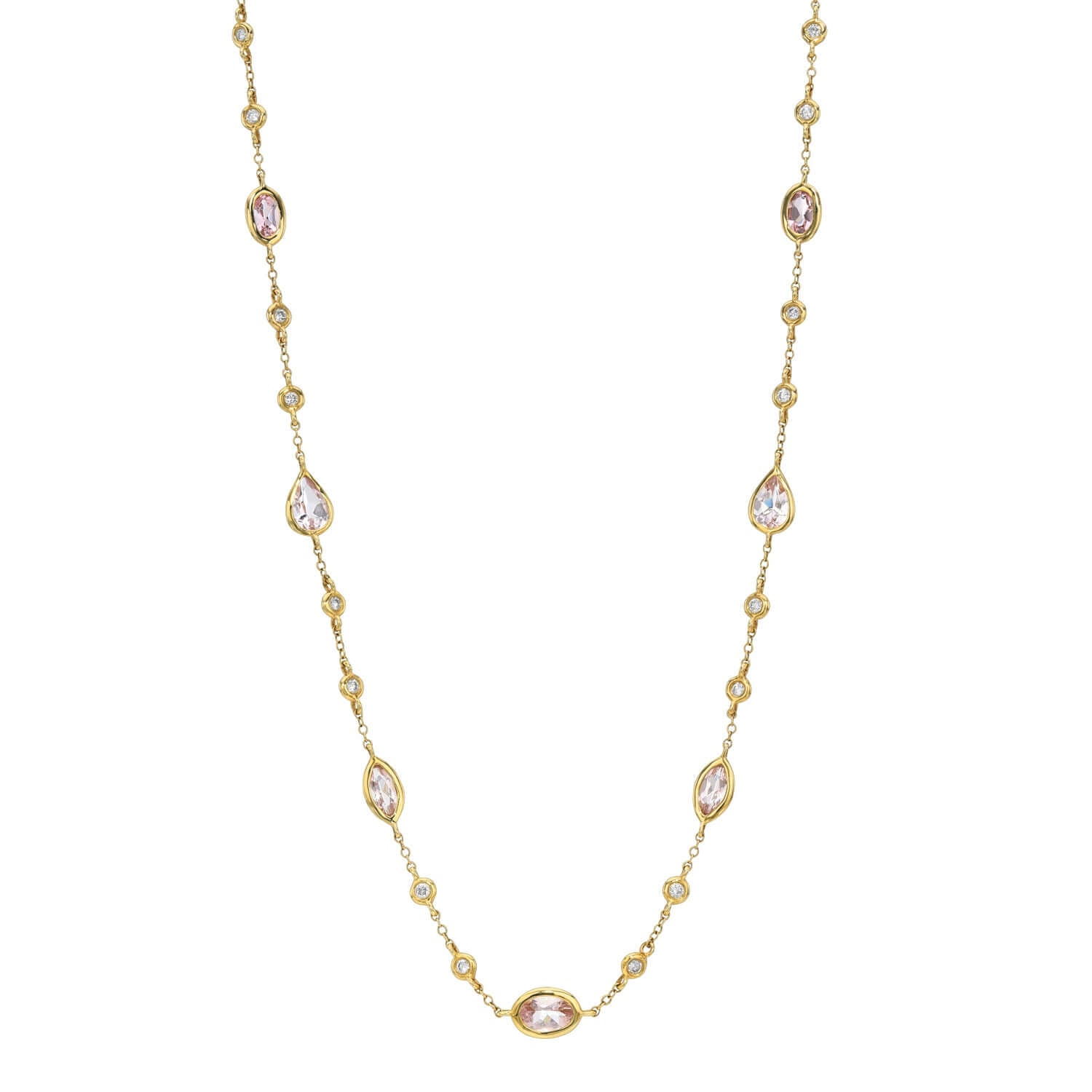 The Morganite & Diamond Necklace by Janet Heller Fine Jewelry is crafted in 14KT gold. The delicate necklace features evenly spaced oval and teardrop stones along the chain. The necklace can be worn alone or layered with other chains.