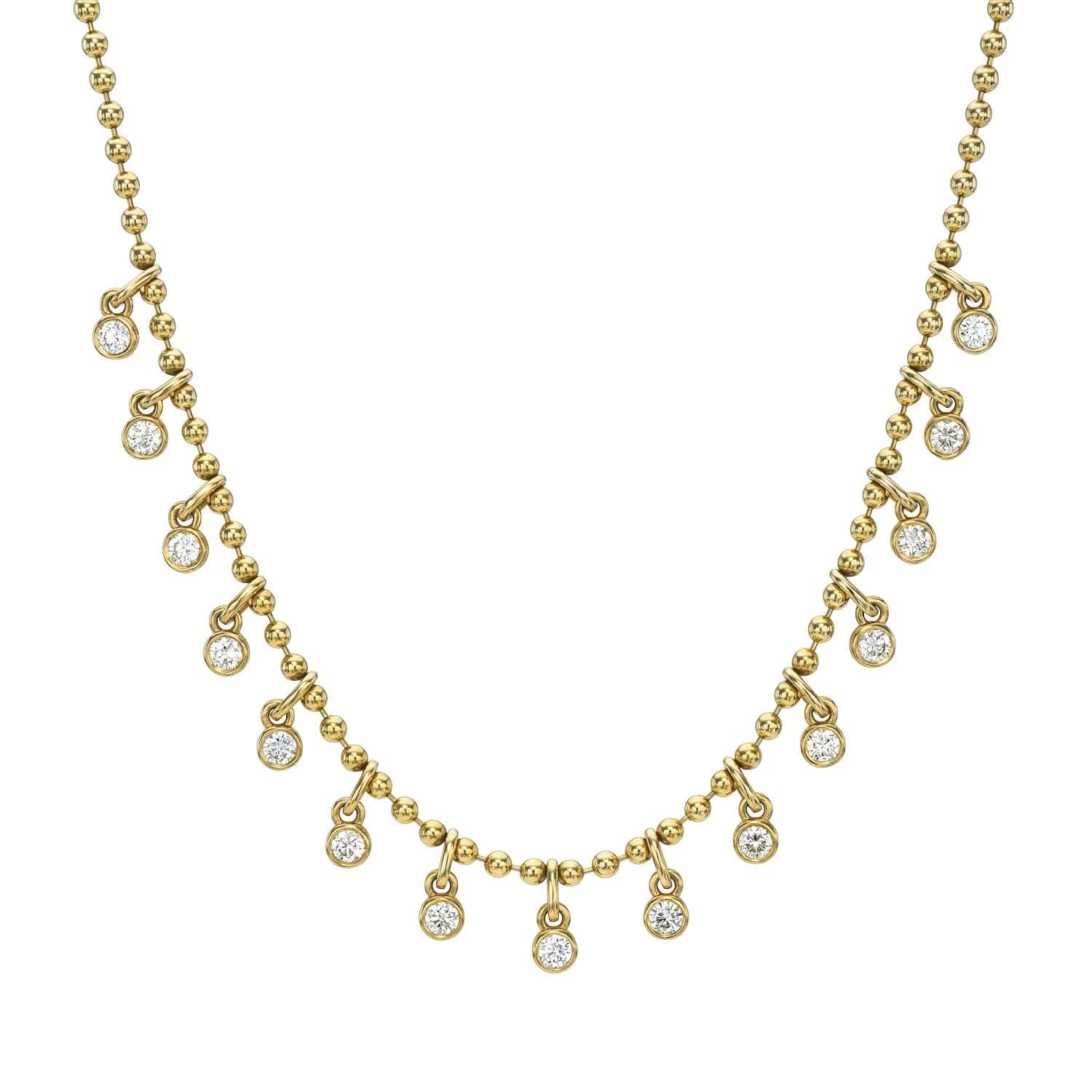 The Diamond Dallas Necklace from Janet Heller Fine Jewelry features small, evenly spaced diamond-like stones in simple gold settings along a delicate chain, combining elegance with a classic look and customization options.