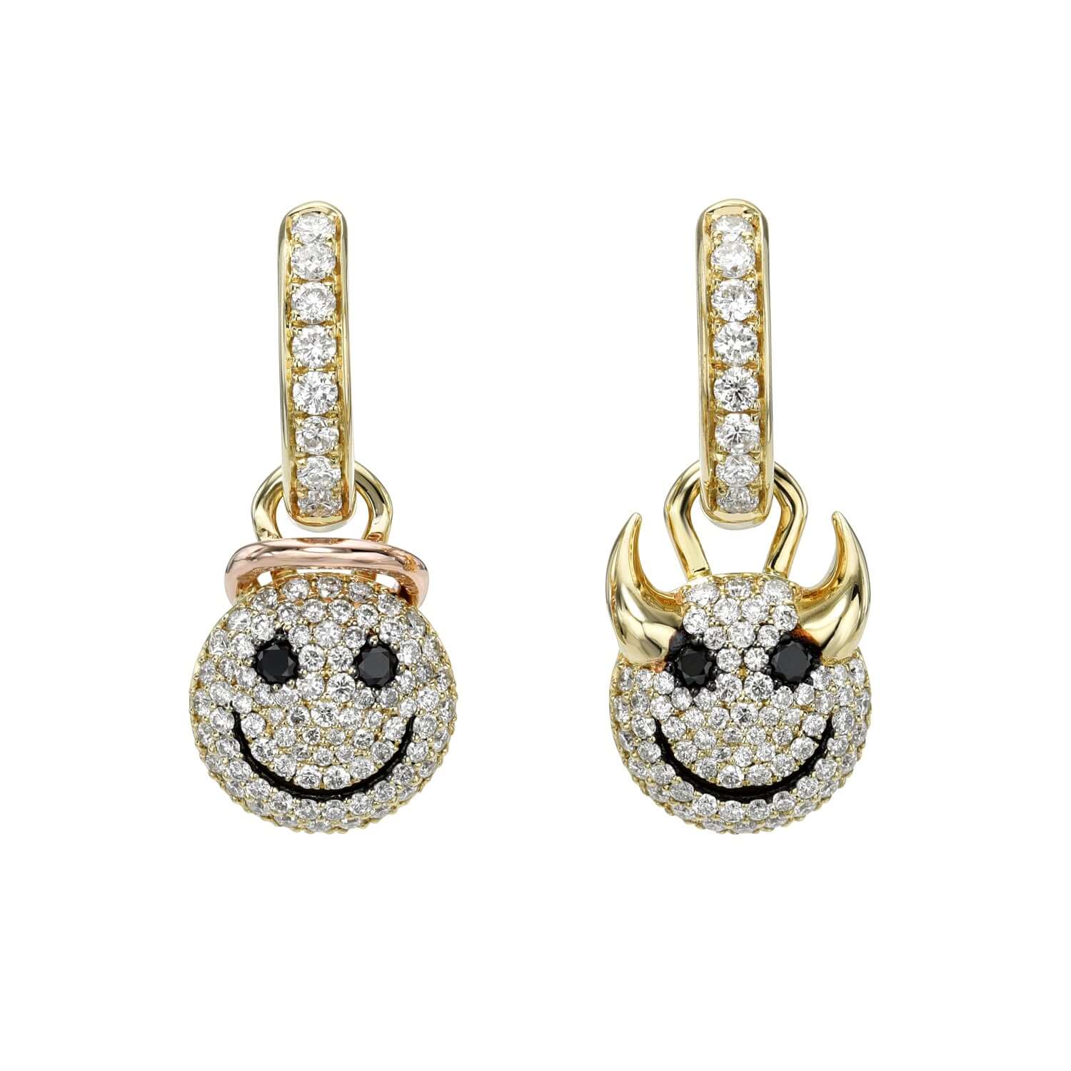 The Naughty or Nice Earrings from Janet Heller Fine Jewelry are crafted in 14KT gold. The dangling earrings feature hoops with a smiley face in black and white diamonds. These playful earrings can be worn alone or layered along the ear with other earrings.