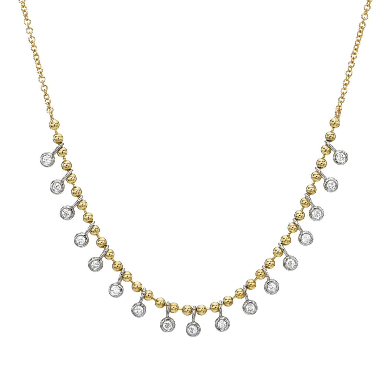 The Beaded Two Tone Diamond Necklace by Janet Heller Fine Jewelry showcases a gold chain with alternating small gold beads and round diamond pendants creating a symmetrical pattern along the chain.