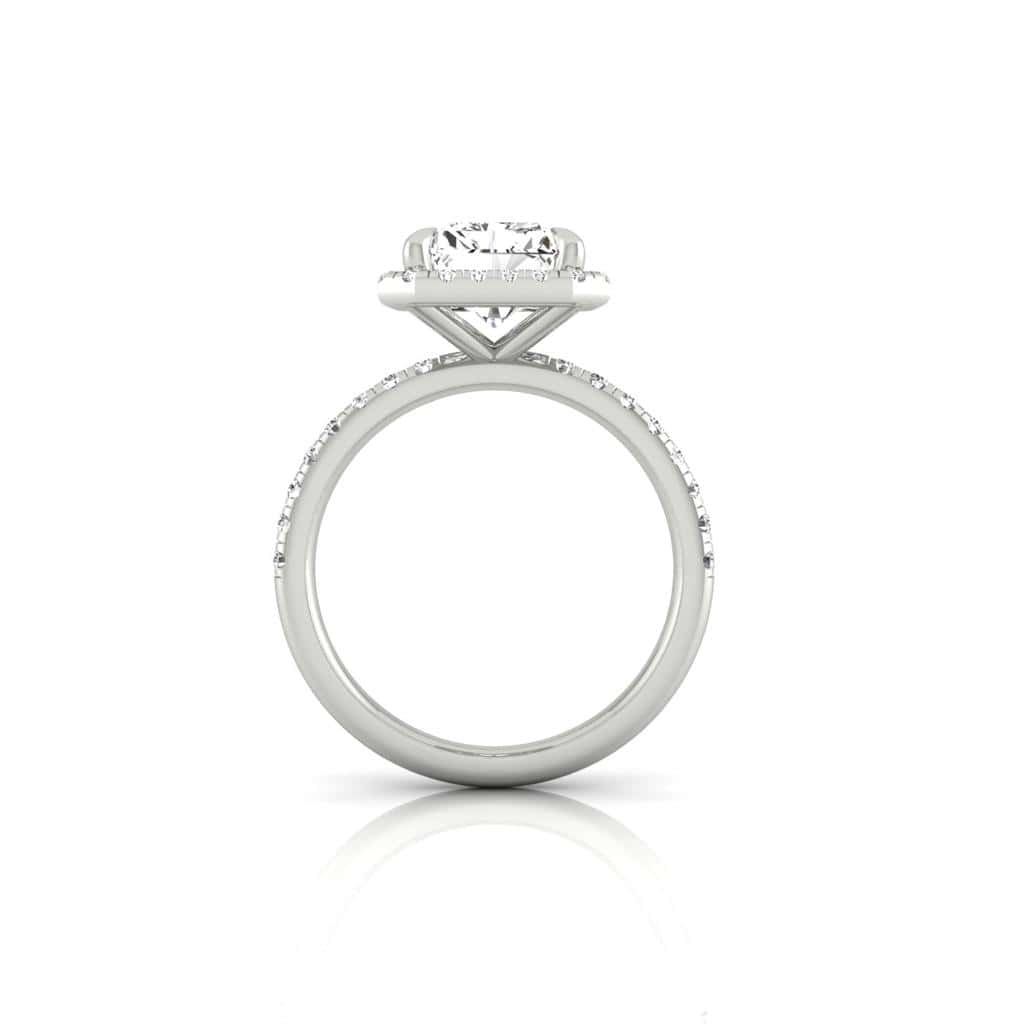 The Unity + Full Halo engagement ring from Janet Heller Fine Jewelry features a single prong-set center diamond on a U prong set pave diamond band and a full diamond halo.
The ring can be worn alone or stacked with your wedding band.