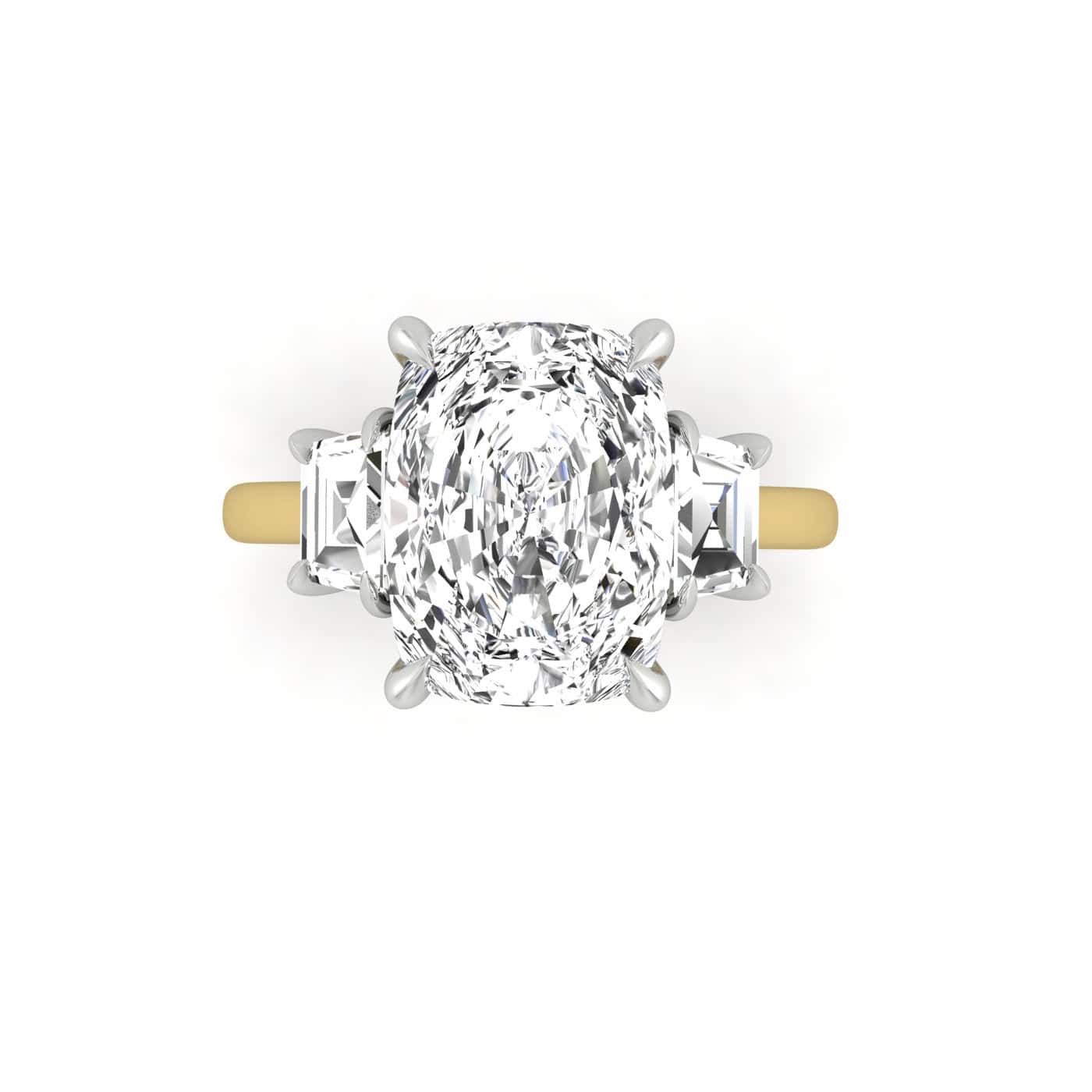 The Triad features a top view of an engagement ring with a large oval center stone flanked by diamond side stones. Its elegant design combines an 18KT gold band accented with silver, enhancing the radiant and timeless allure.