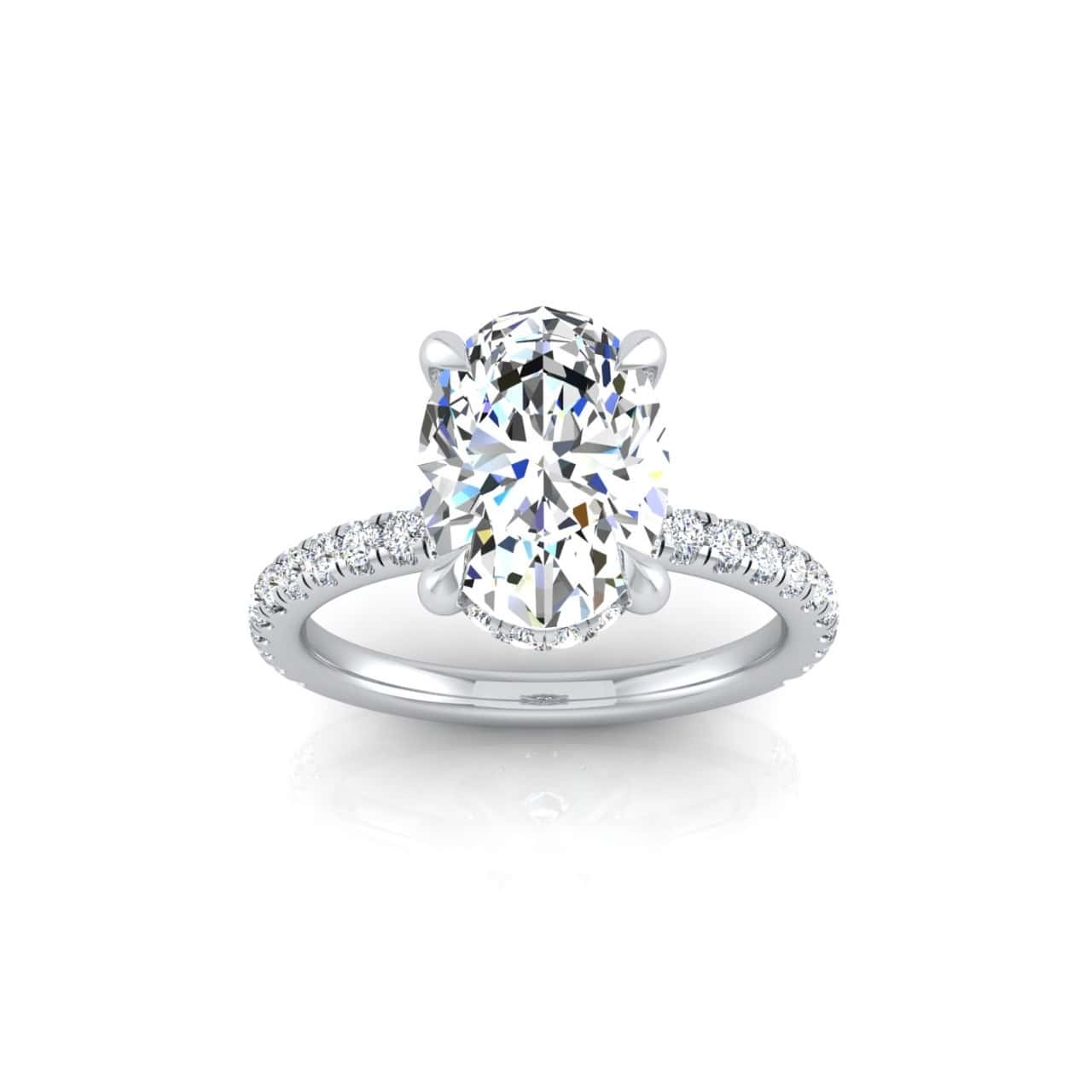 The Unity + Hidden Halo engagement ring showcases an oval diamond centerpiece with a pavé band and subtle hidden halo, elegantly displayed on a white background.