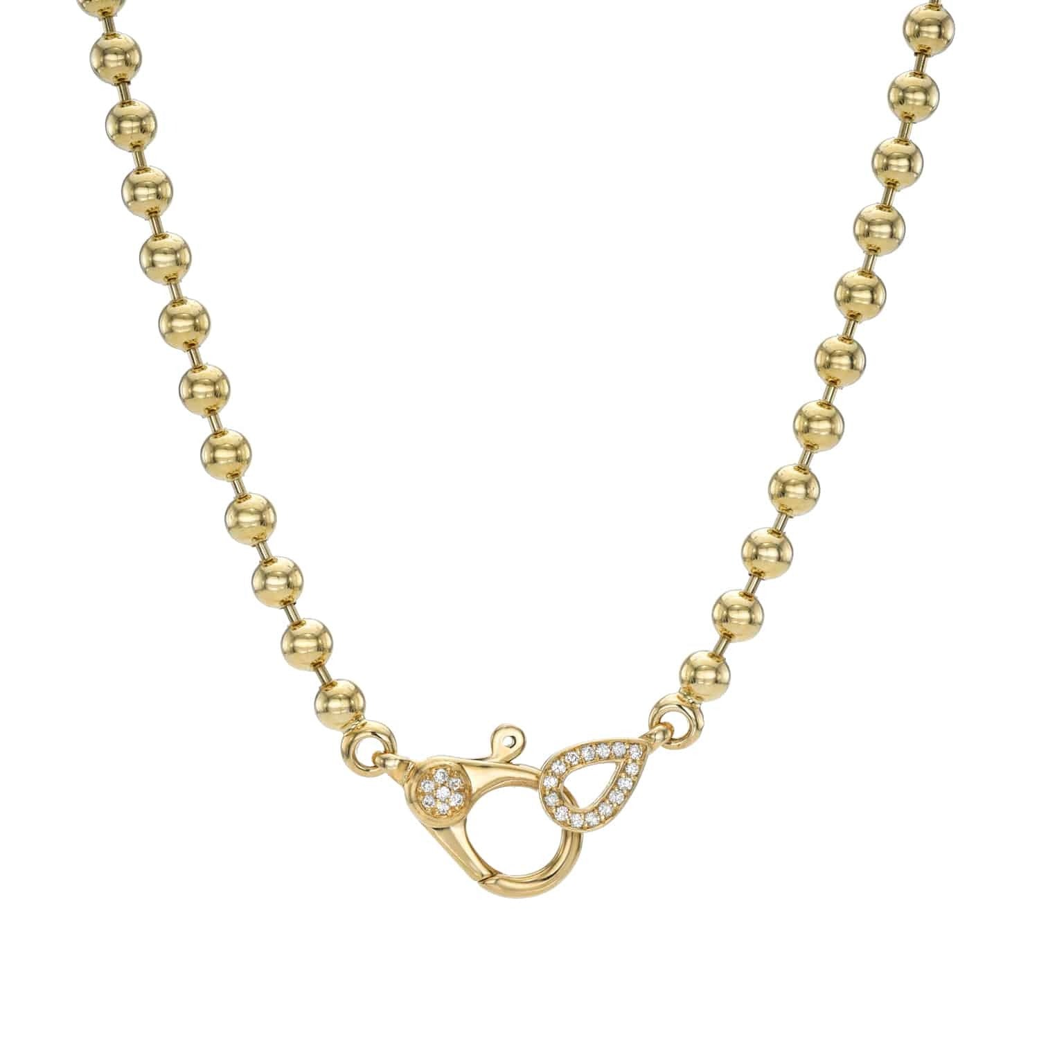 A gold beaded 4mm Paris Chain with a clasp featuring teardrop-shaped and circular designs, both adorned with small clear gemstones, from Janet Heller Fine Jewelry. This elegant necklace is perfect for layering or wearing on its own, making it a timeless addition to your collection of charms.