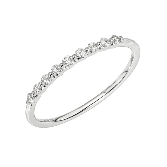 The 9 Diamond Delilah Ring is a delicate, minimalist stacking ring featuring nine small round white diamonds set along the top half of the band—ideal for layering with your other favorites.