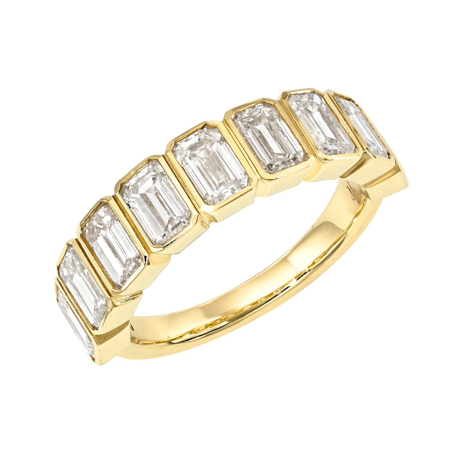 The Half Lab Emerald Cut Diamond Ring by Janet Heller Fine Jewelry features a row of rectangular emerald-cut lab diamonds set in individual 14KT gold bezels along the band.