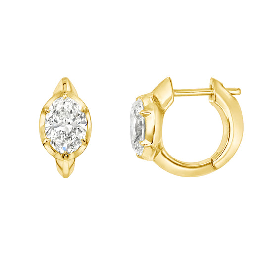 The Lab Oval Bezel Diamond Huggies by Janet Heller Fine Jewelry are 14KT gold hoop earrings featuring bezel-set lab diamond ovals, displayed from front and side views on a white background.