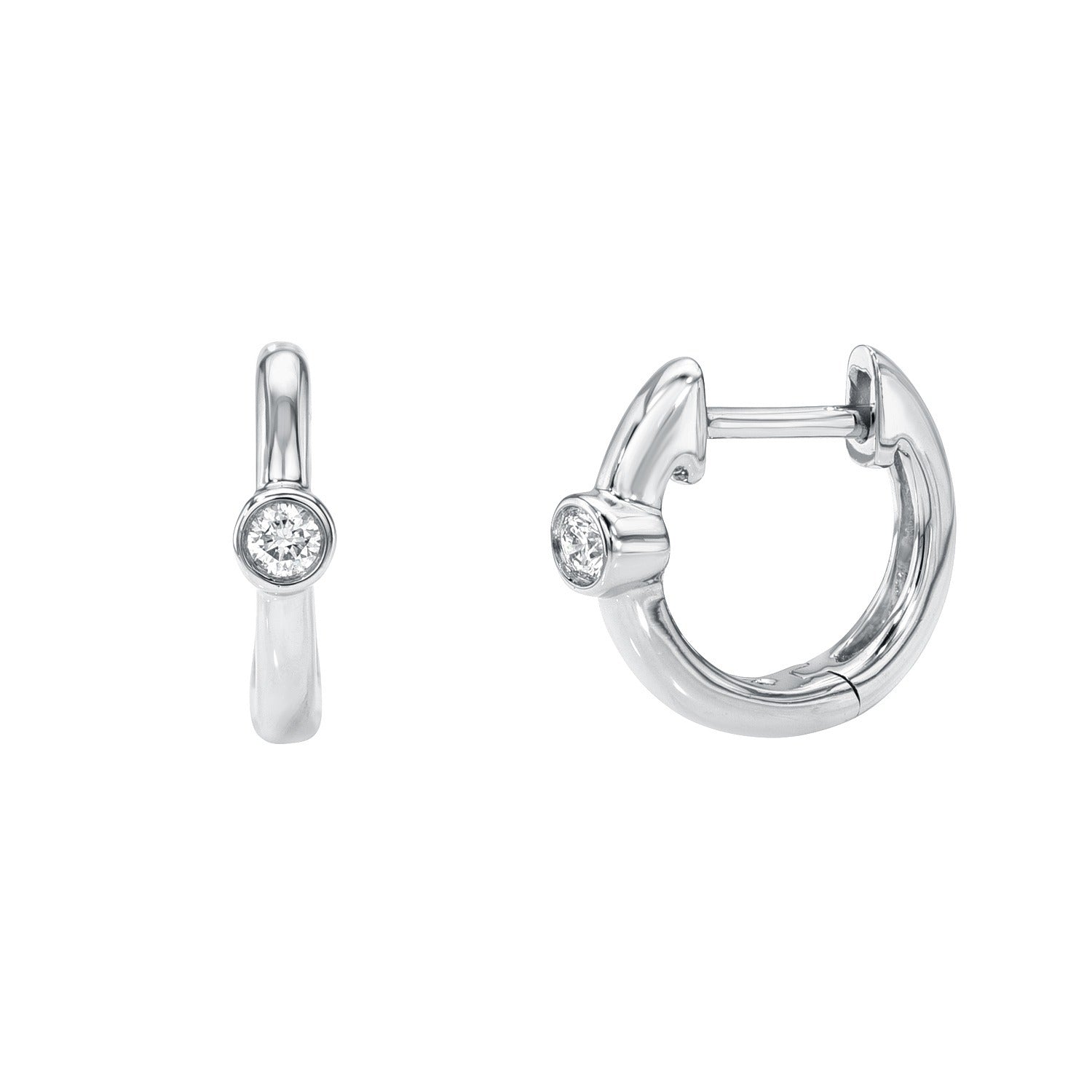 Pair of small, silver Diamond Axel Huggies earrings, each featuring a single round clear gemstone set at the front, shown both open and closed on a plain white background—a timeless piece from Janet Heller Fine Jewelry that beautifully captures the essence of fine jewelry.