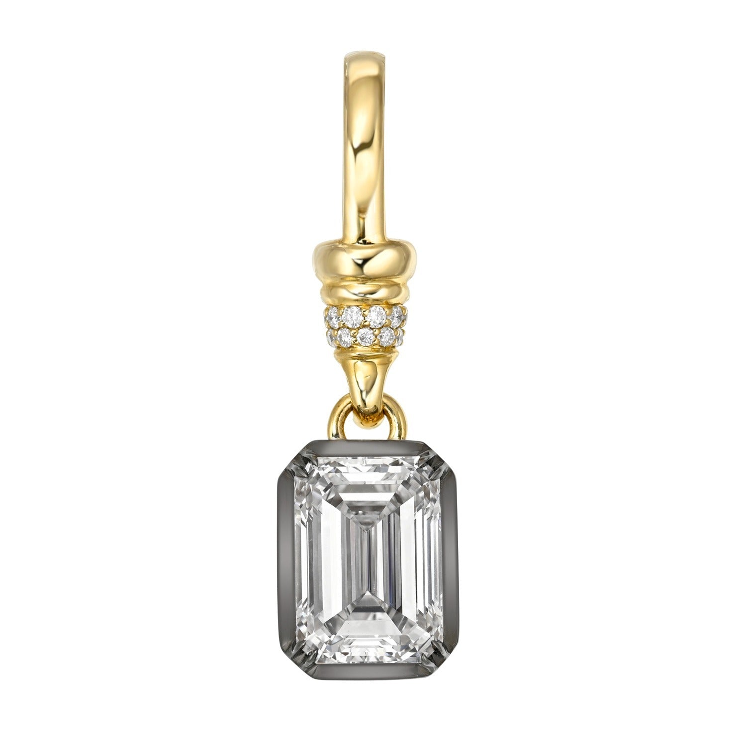 Discover timeless elegance with the Emerald Cut Lab Diamond Charm—a gold earring showcasing a striking emerald-cut clear gemstone pendant, elegantly accented by a row of pavé-set lab diamonds above the gem and expertly crafted in 14KT gold.