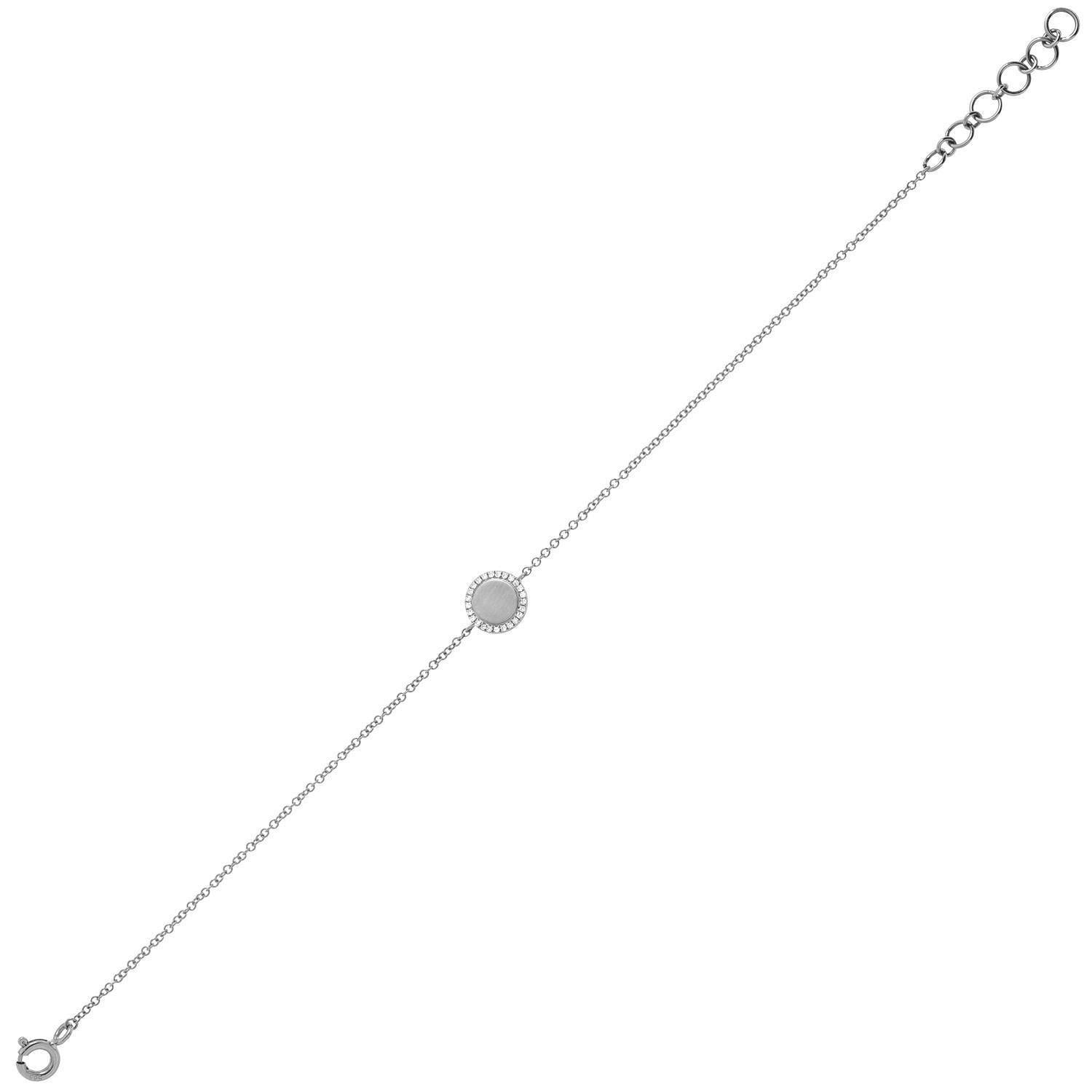 An elegant Engravable Diamond Disc Bracelet featuring a textured round central charm and an adjustable silver chain with multiple fastening loops.