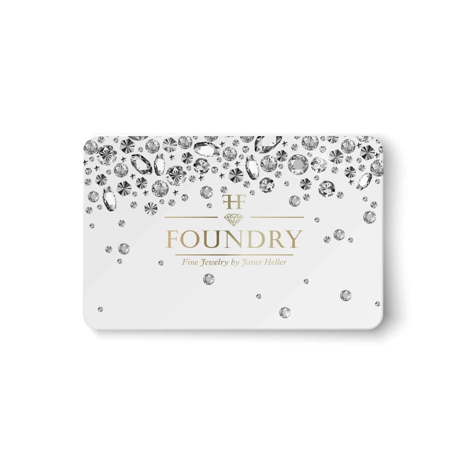 A white Gift Card adorned with scattered diamond illustrations at the top, featuring the FOUNDRY Fine Jewelry by Janet Heller logo and gold text in the center.