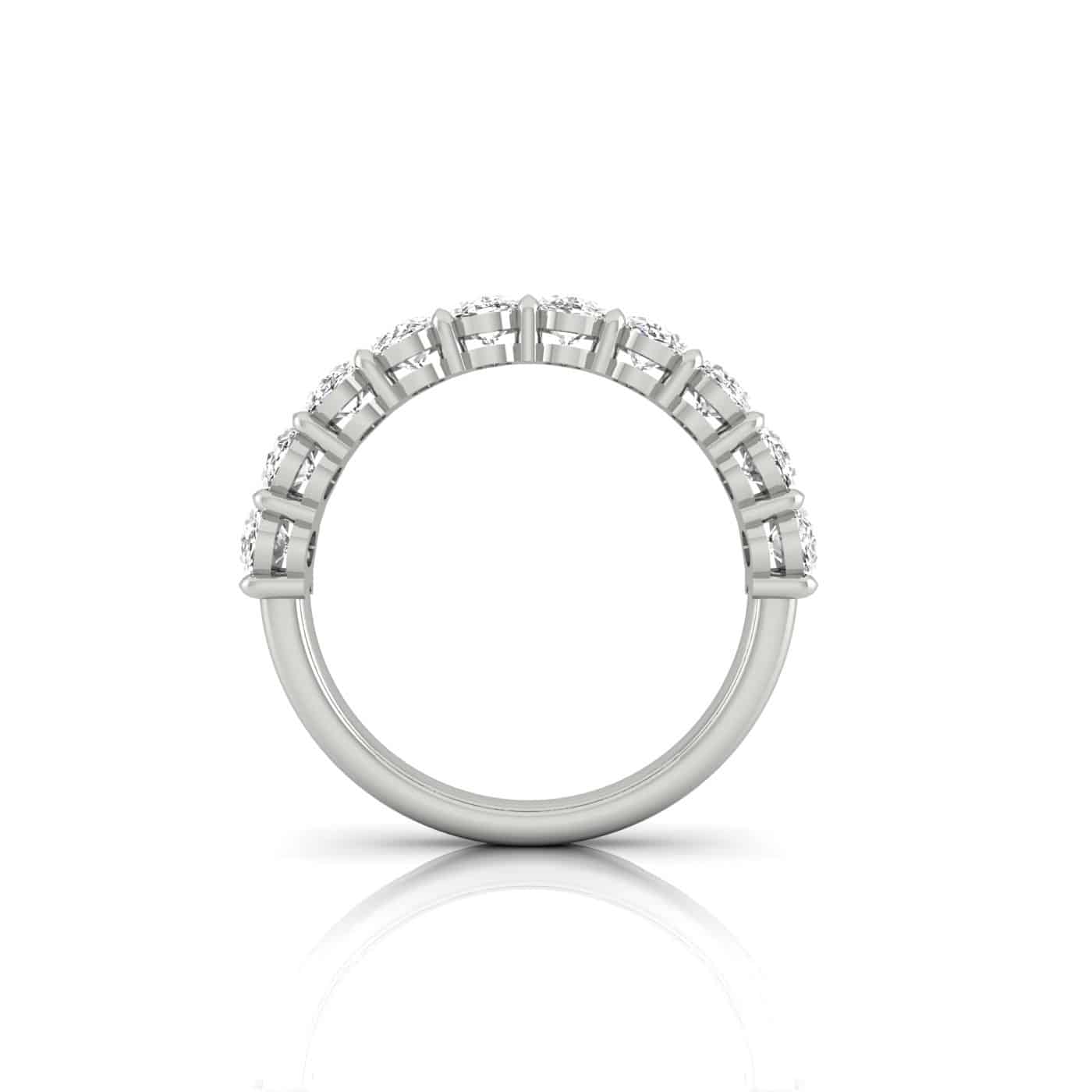 Certainly! Here’s the rewritten sentence using your product data: The "Test - Half Diamond Eternity Ring" (SKU: RIN-1344-CU-1-W), crafted in silver, showcases a side view of its elegant and classic design. A row of round, sparkling diamonds is prong-set along the top half of the band, creating a timeless and sophisticated look. Price: $2,500.00.