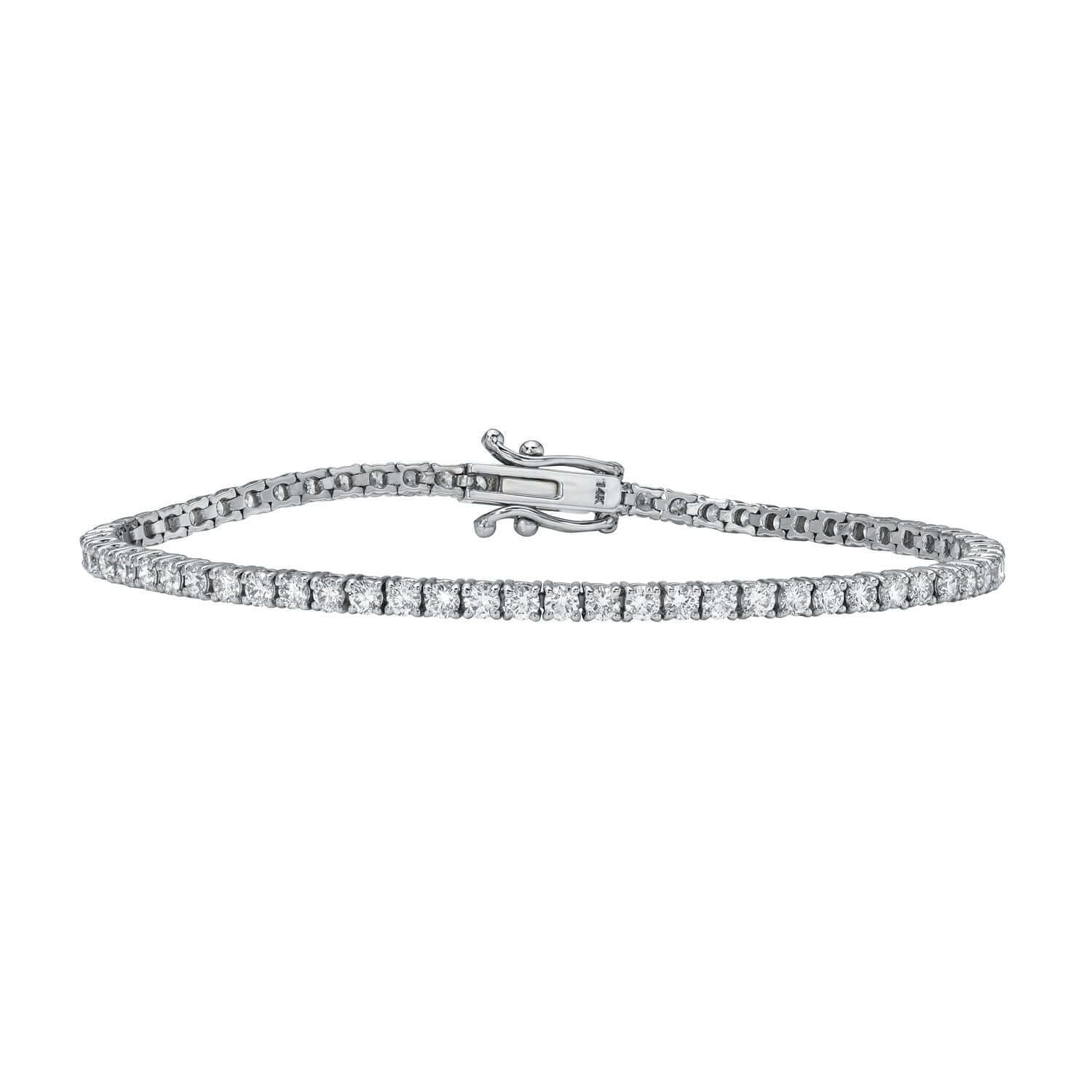 The 3ct Round Diamond Tennis Bracelet showcases sparkling natural diamonds in a delicate silver setting with a secure clasp, displayed on a white background—a timeless fine jewelry piece.