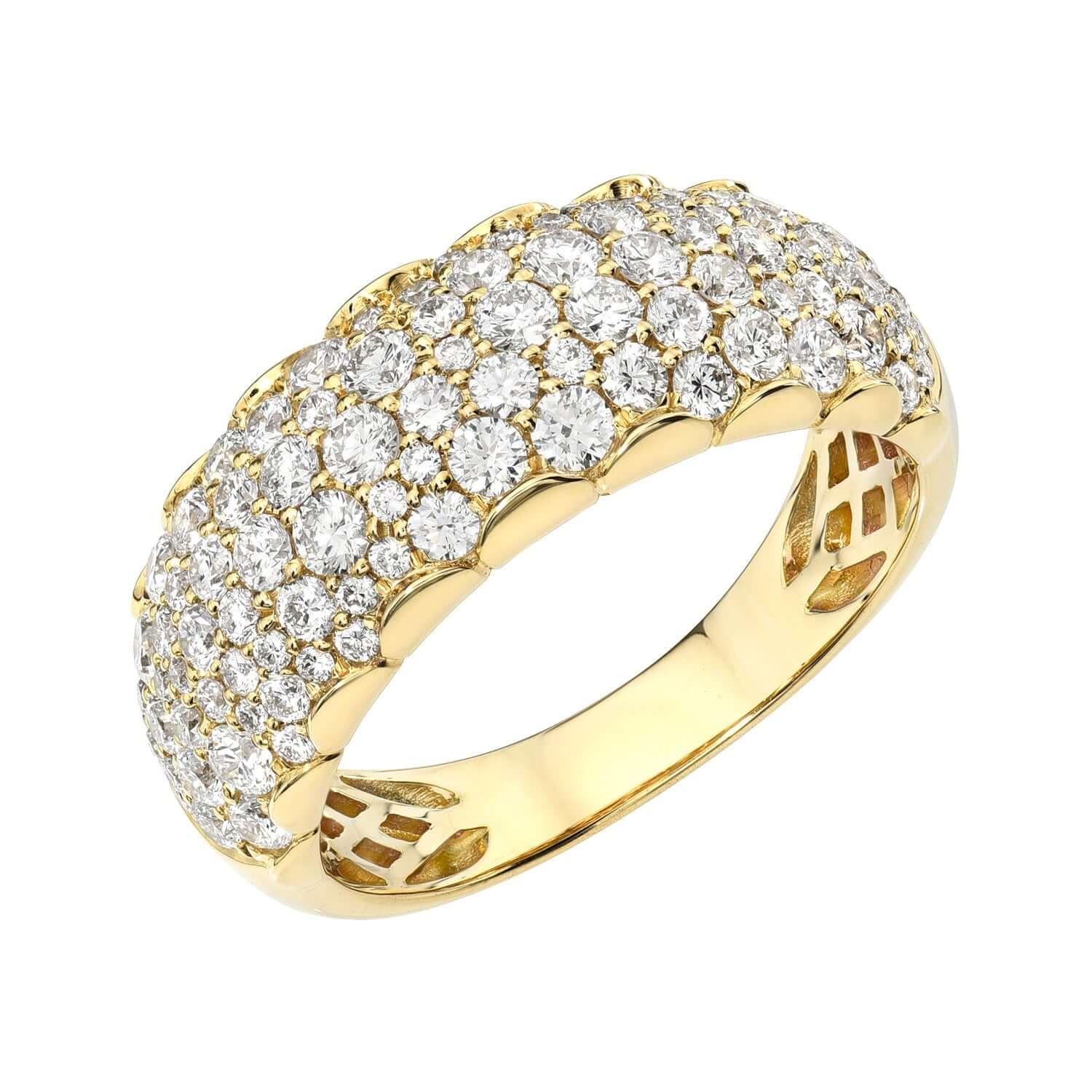 The Diamond Mosaic Ring from Janet Heller Fine Jewelry is crafted in 14KT gold.  The ring is encrusted with multiple diamonds in various sizes.  The band can be worn alone or stacked with other rings.