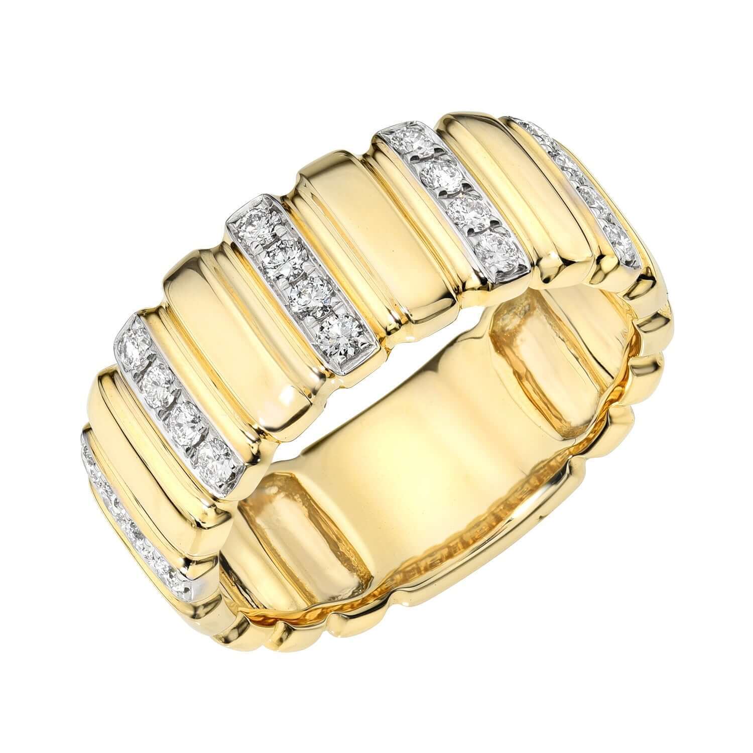 The Diamond Frankie Ring by Janet Heller is a wide gold band with a ridged design, adorned with parallel rows of small, sparkling diamonds nestled between raised gold sections. Available for preorder, this exquisite piece exemplifies timeless elegance and expert craftsmanship.