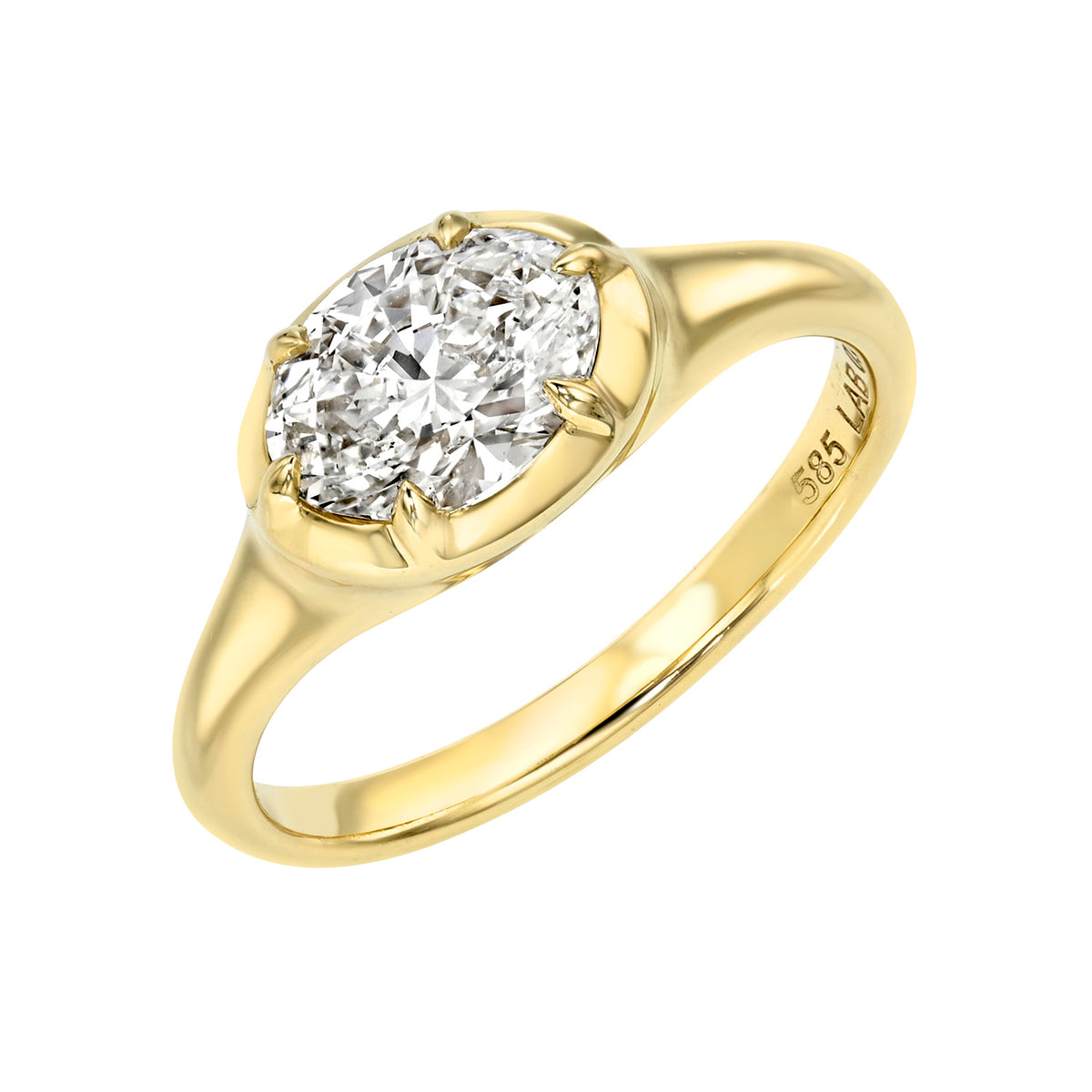 Introducing the Oval Lab Diamond Oval Pinky Ring—featuring a single large oval lab diamond set in a claw setting, with “585” engraved on the inside of the gold band.