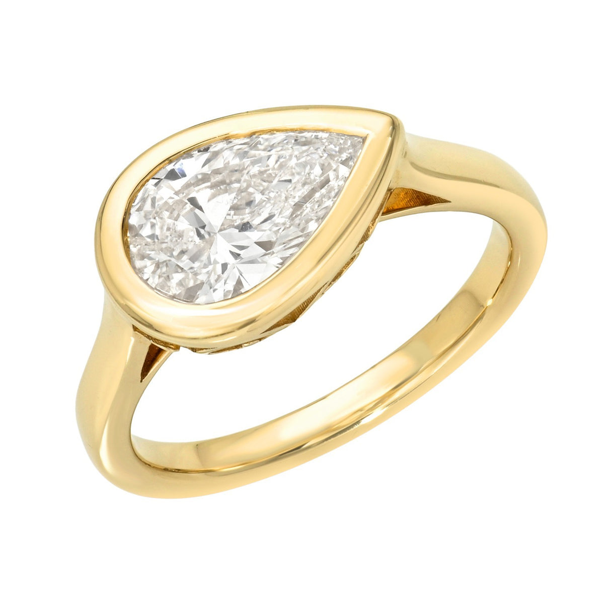 Pear Lab Diamond Mila Ring Size 3.5 featuring a bezel-set pear-shaped diamond on a 14K yellow gold band.