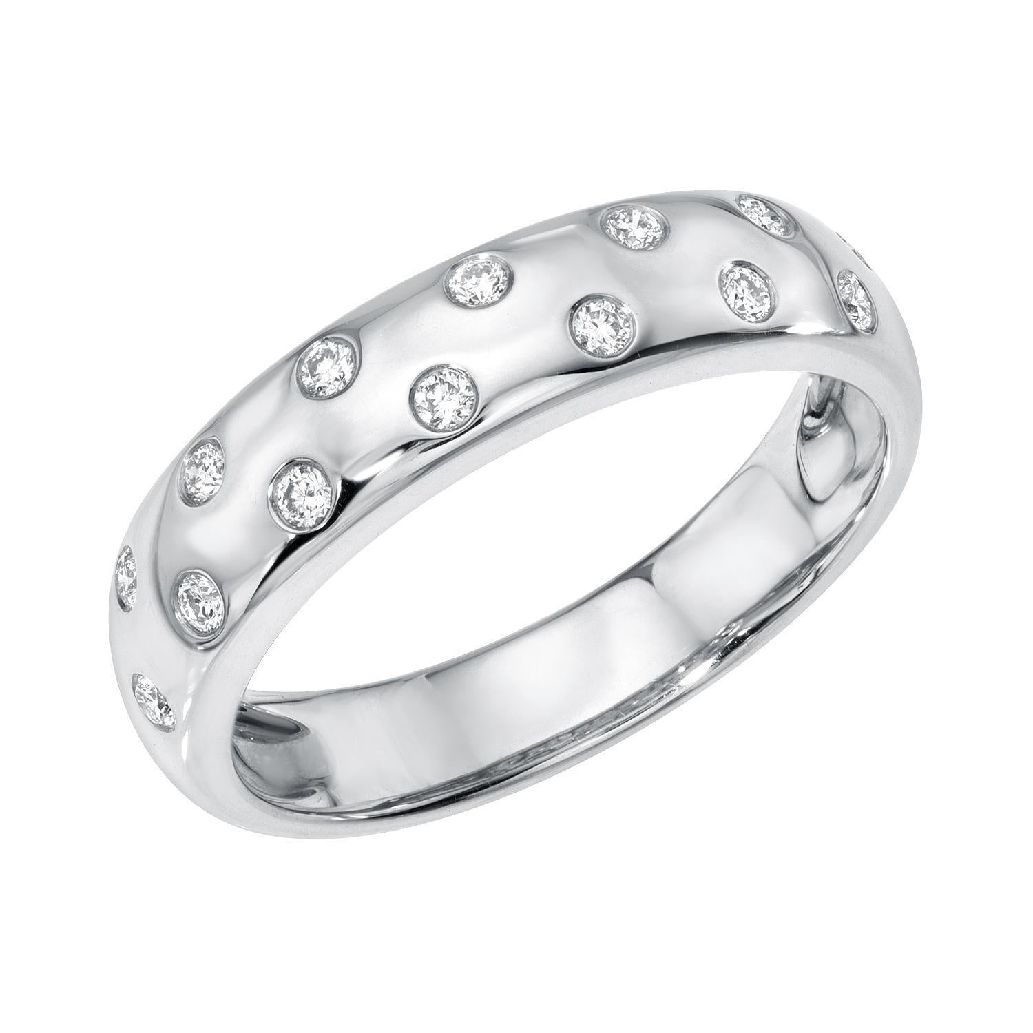 Preorder the Scattered Diamond Ring from Janet Heller’s fine jewelry collection—polished silver with round diamonds set in a dotted pattern for timeless elegance.