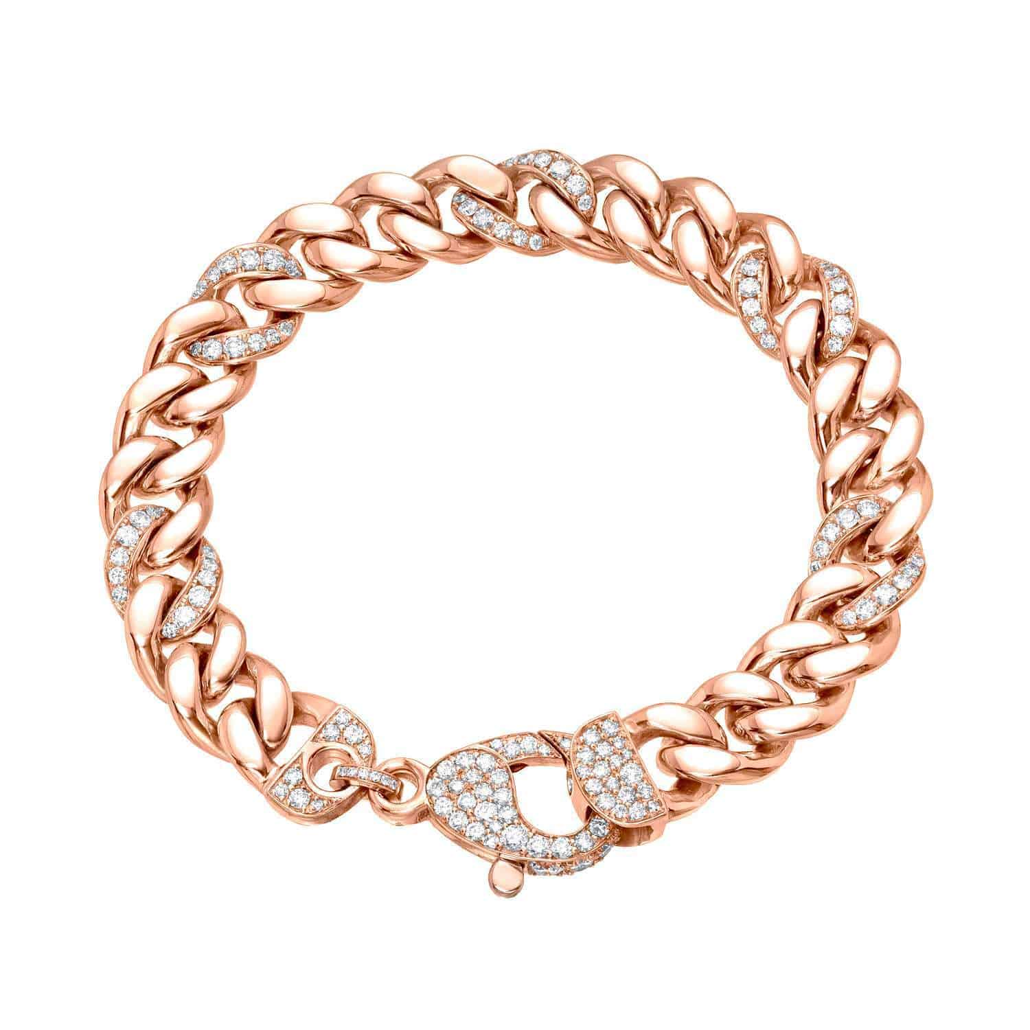 The Alternating Diamond Cuban Link Bracelet features thick, interlocking links in rose gold, each set with sparkling diamonds. Displayed on a white background, this bracelet is a striking example of Janet Heller Fine Jewelry’s dedication to exquisite fine jewelry craftsmanship.