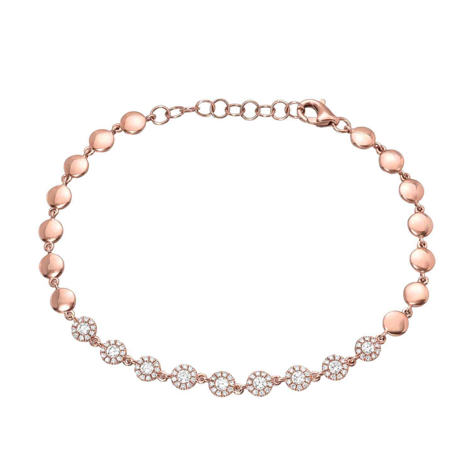 Introducing the Diamond Annabel Bracelet: a rose gold bracelet featuring alternating plain circular links and crystal-studded circles, each adorned with sparkling clear crystals. Secured with a lobster clasp closure, this exquisite piece showcases Janet Heller Fine Jewelry's signature craftsmanship. For custom jewelry requests or inquiries, discover more at Janet Heller Fine Jewelry.