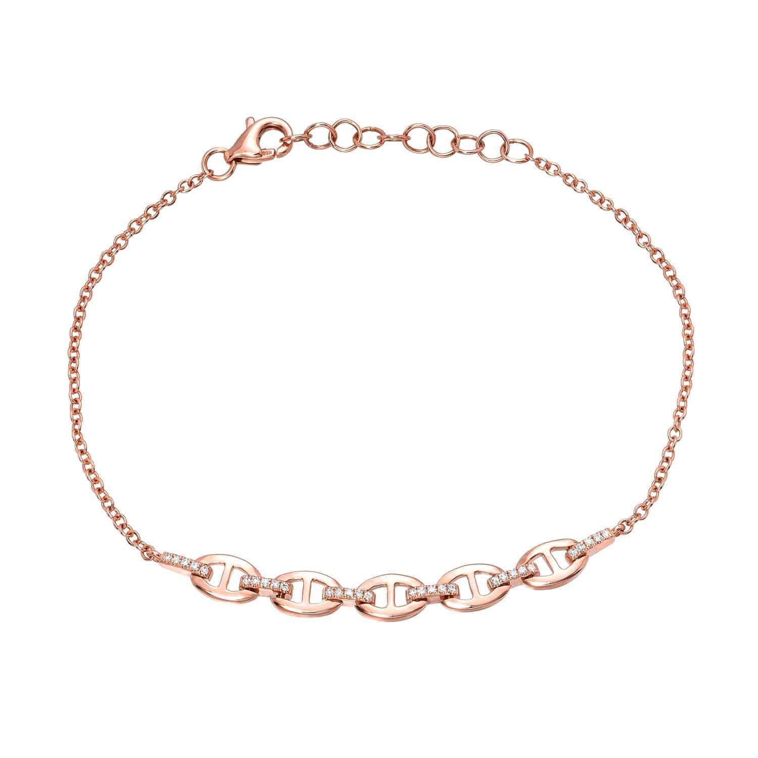 Introducing the Diamond Eloise Bracelet: a delicate rose gold chain bracelet featuring five interlocking oval links, each adorned with sparkling clear stones and finished with an adjustable clasp closure. This exquisite creation from Janet Heller Fine Jewelry elevates any look. For custom jewelry options or inquiries about this piece, please contact us.