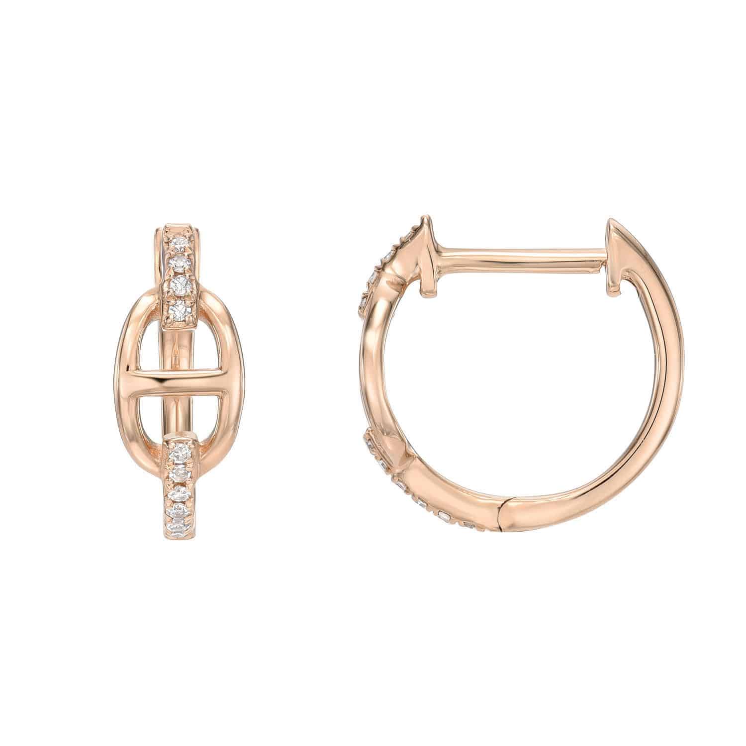 Introducing the Diamond Link Evie Huggies from Janet Heller’s fine jewelry collection. These rose gold hoop earrings feature a horizontal bar and vertical oval design, accented by small clear gemstones on the front. Shown from both the front and side, these custom jewelry pieces showcase exquisite craftsmanship and unique detailing.