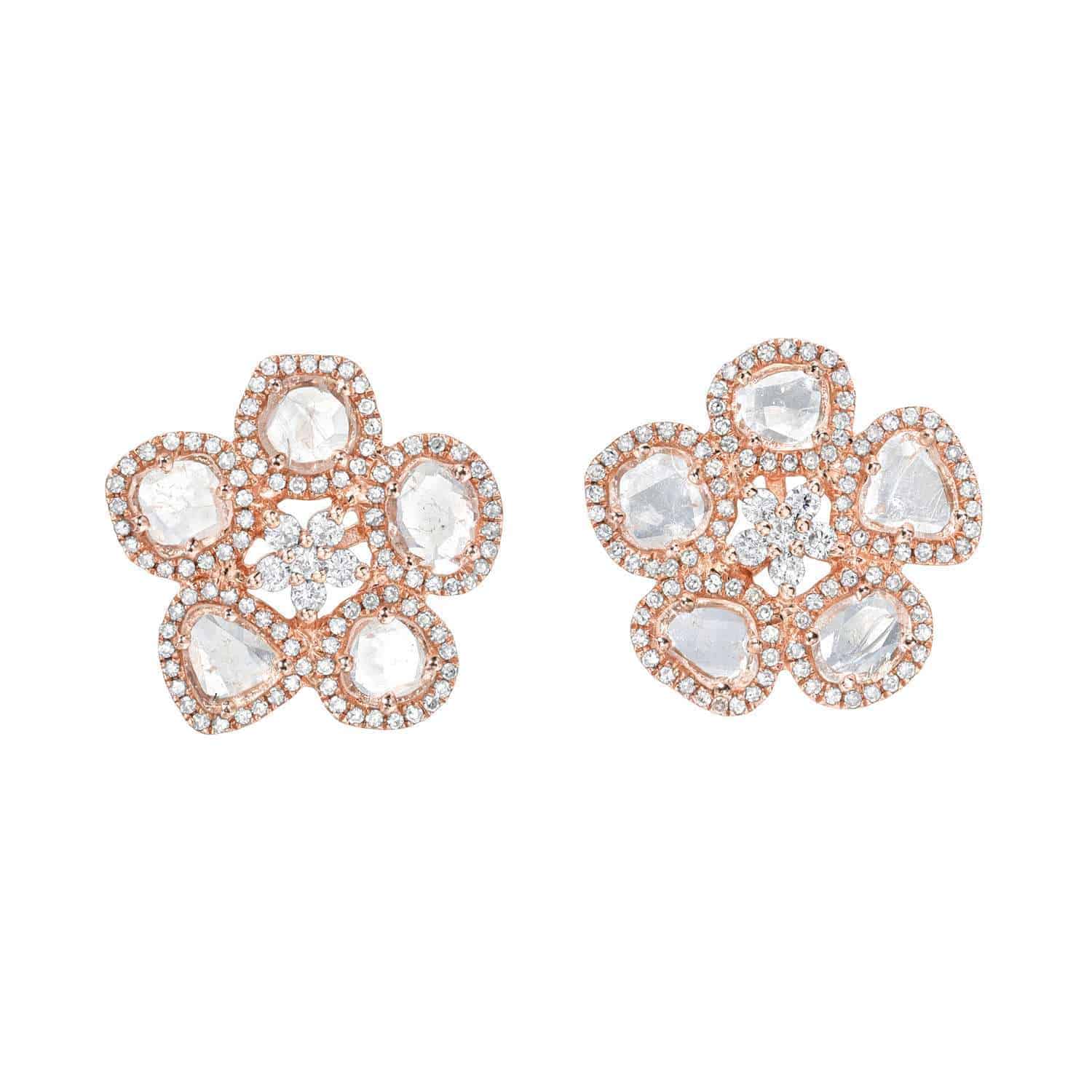 Introducing the Diamond Slice Flower Studs: exquisite floral-shaped earrings featuring white diamond slices arranged as petals and center, set in a luxurious rose gold base and outlined with sparkling diamonds.