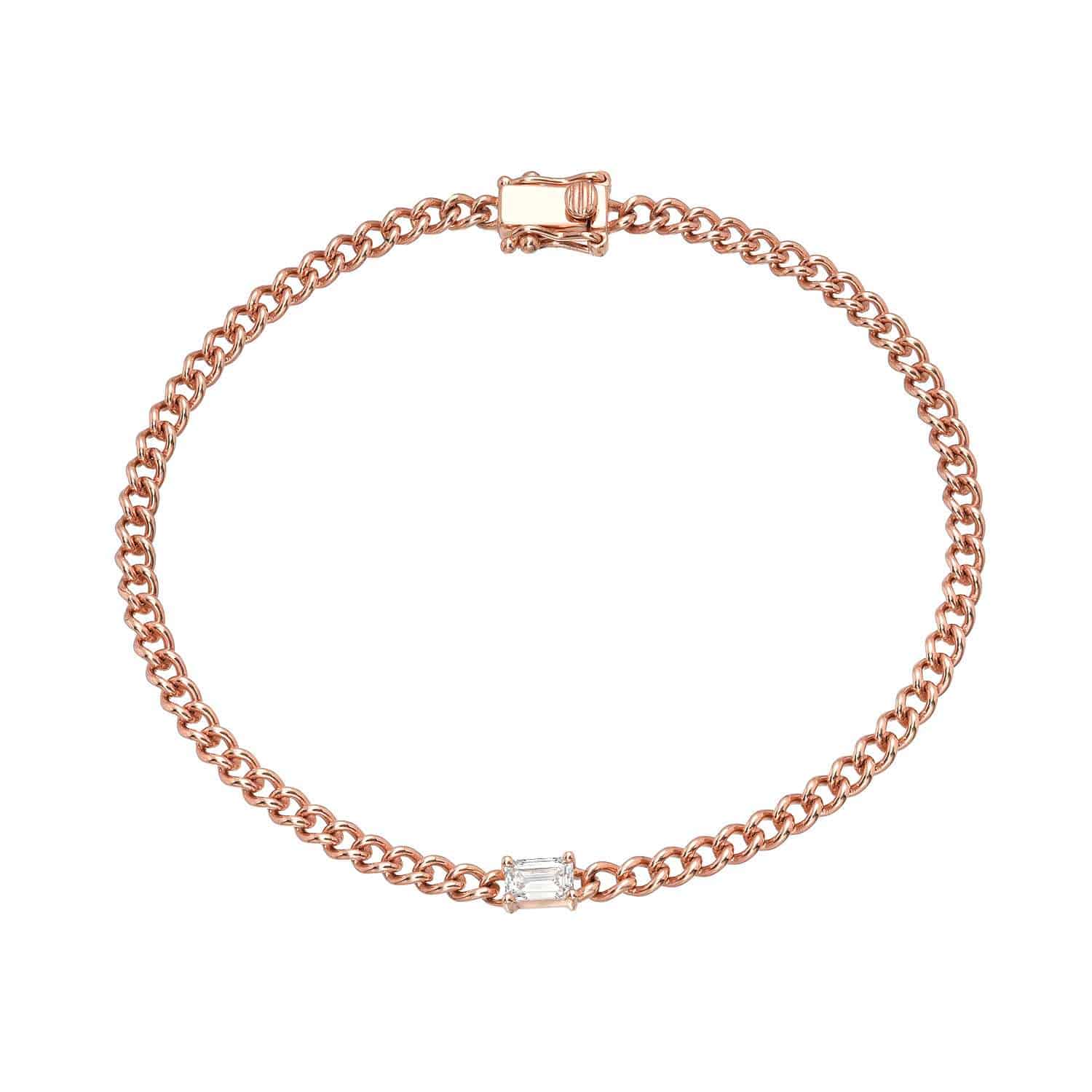 Emerald Cut Aurora Bracelet: A rose gold chain bracelet with a single rectangular-cut gemstone at the center and a secure clasp.