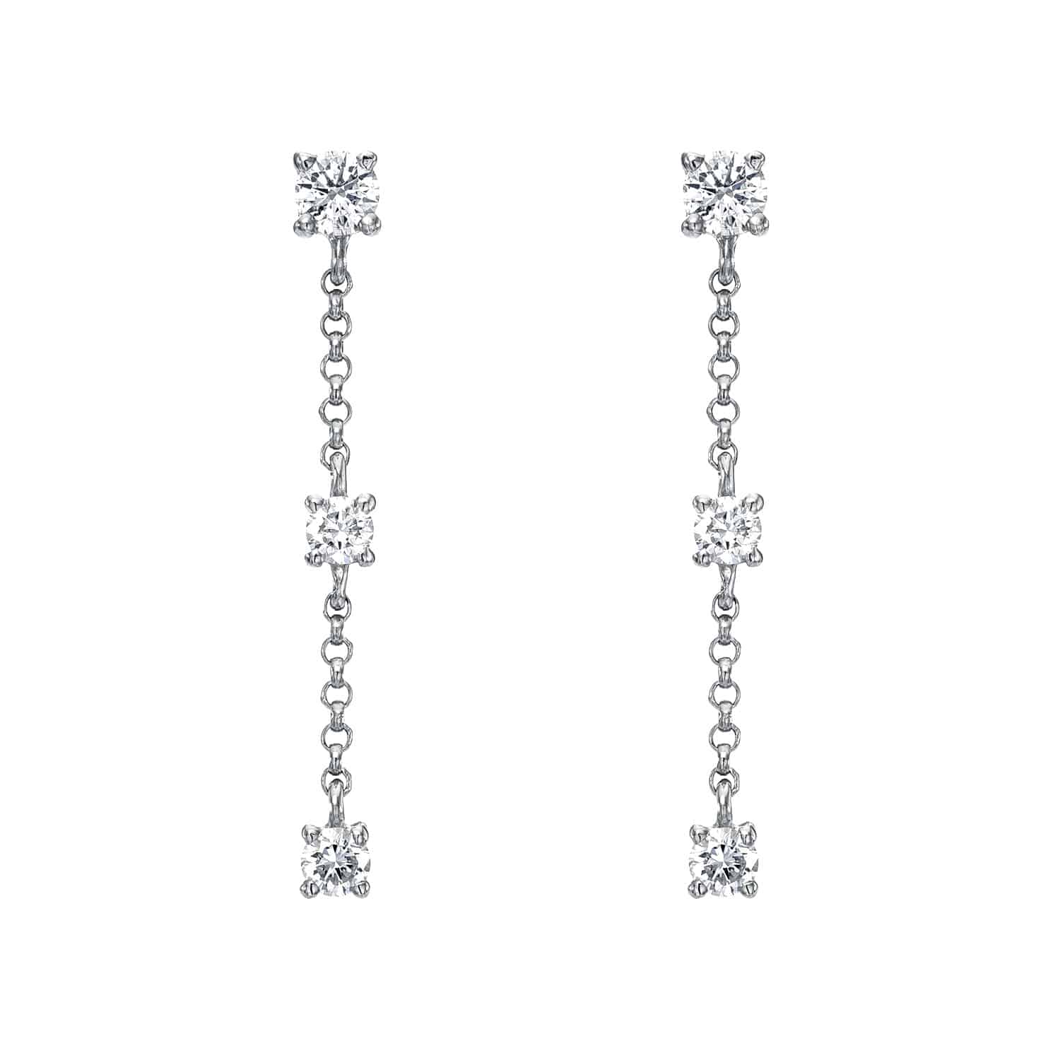 Introducing the 3 Drop Diamond Finley Earrings—elegant silver drop earrings featuring three round, clear diamonds suspended by delicate chain links in each earring, displayed vertically against a plain white background. Priced at $748.00, these stunning earrings make a luxurious addition to any fine jewelry collection.