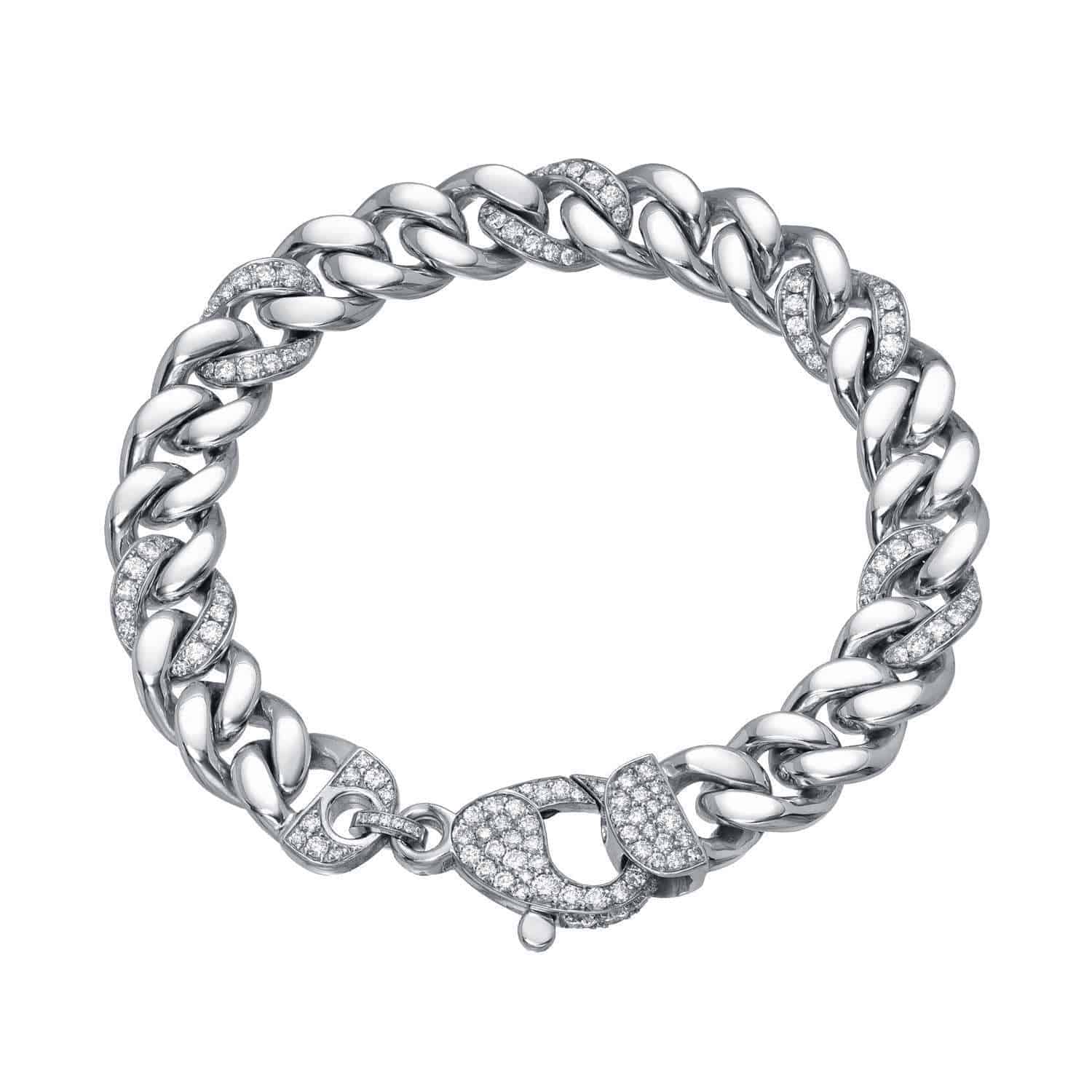 Discover the Alternating Diamond Cuban Link Bracelet, a striking silver Cuban link design featuring several links and a lobster clasp, both encrusted with sparkling clear diamonds. For custom jewelry requests or inquiries, explore this exclusive piece—available only at Janet Heller Fine Jewelry.